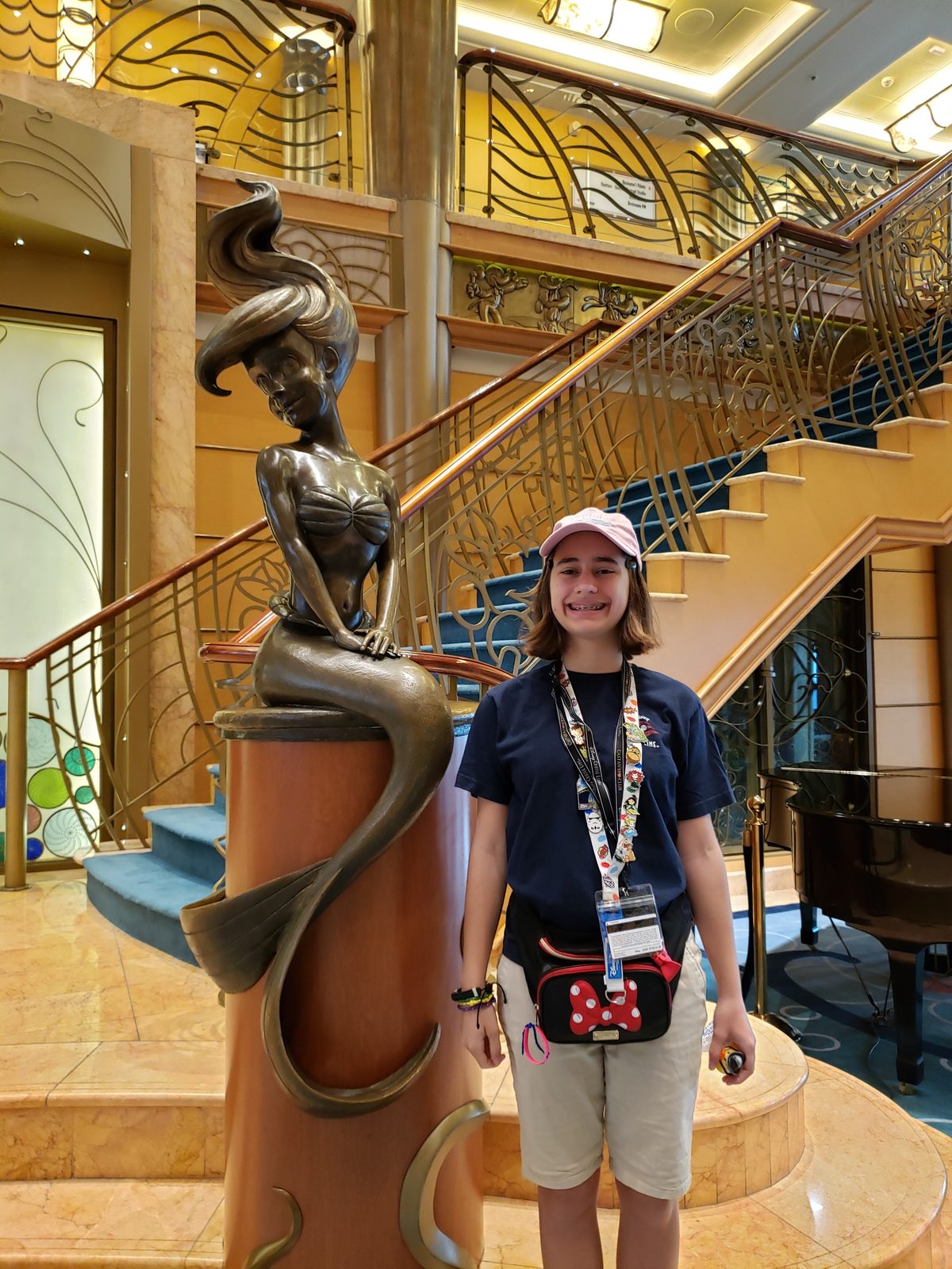 A quiet morning by the atrium's mermaid statue