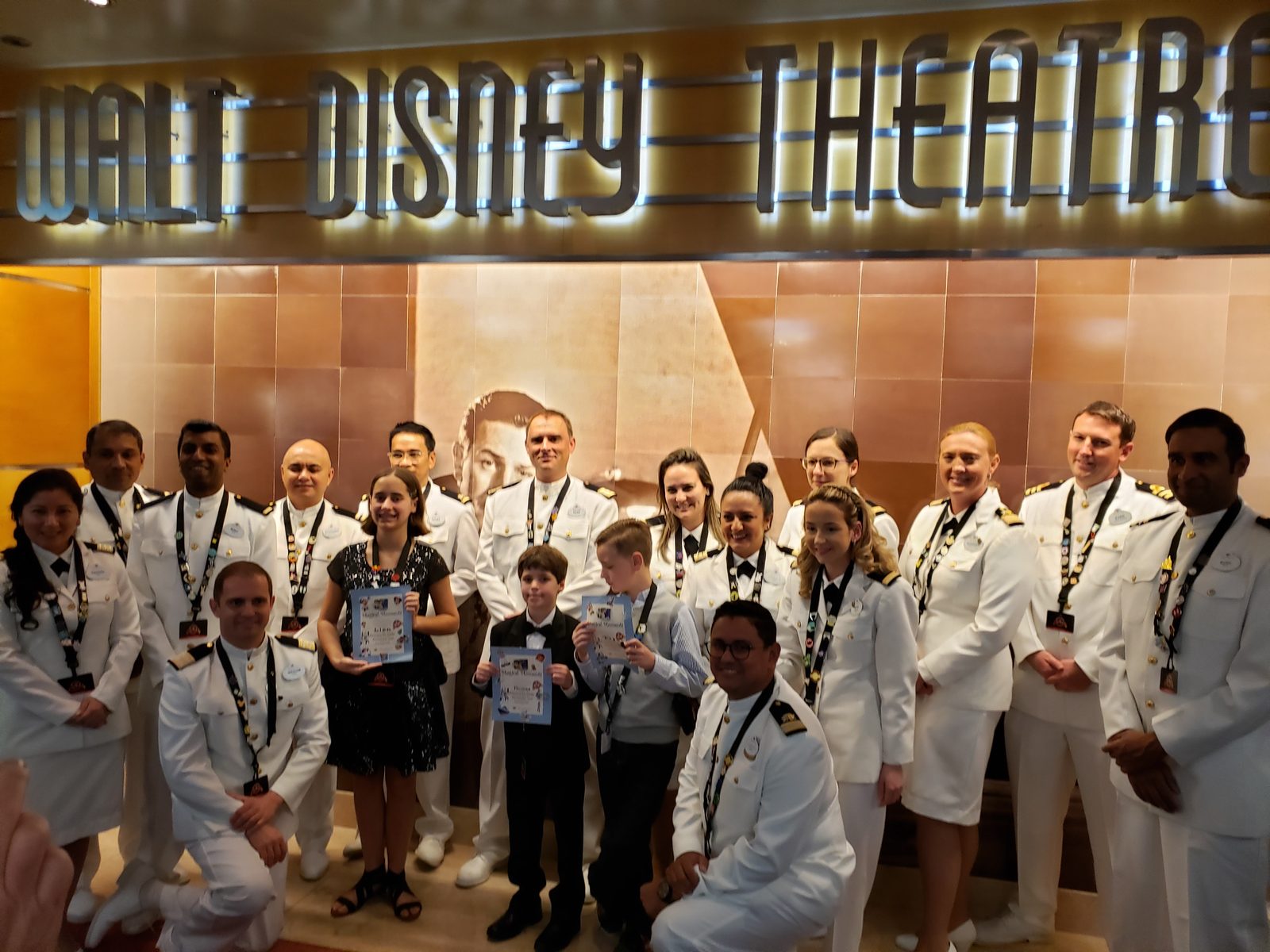 Lisa and Thomas with the officers outside the Walt Disney Theatre