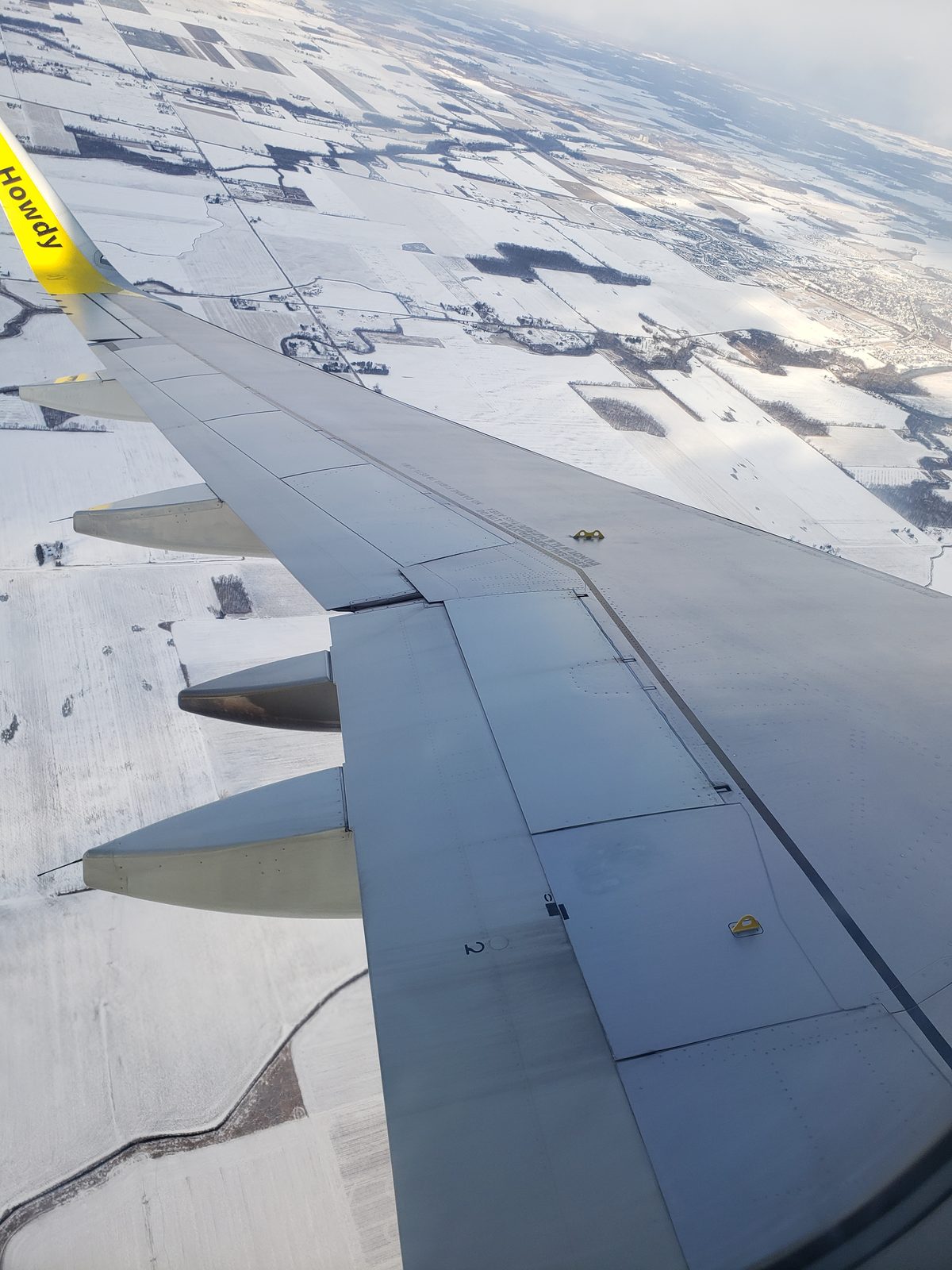 Snow below as we flew back into Michigan