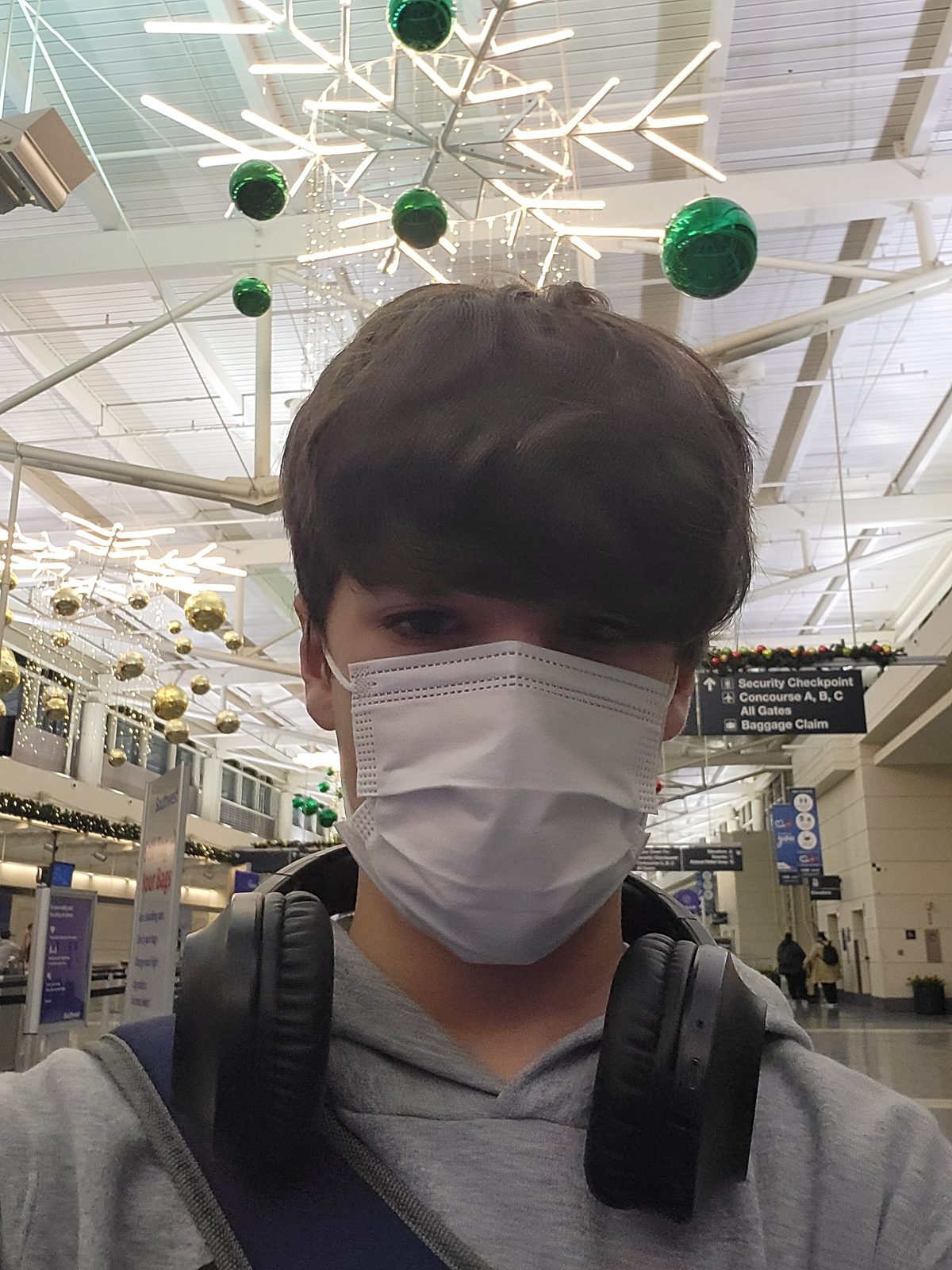 Thomas masked up and ready to fly to Lauderdale
