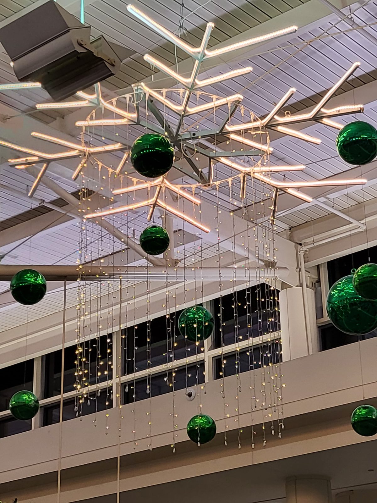 Holiday lights over the Midway concourse