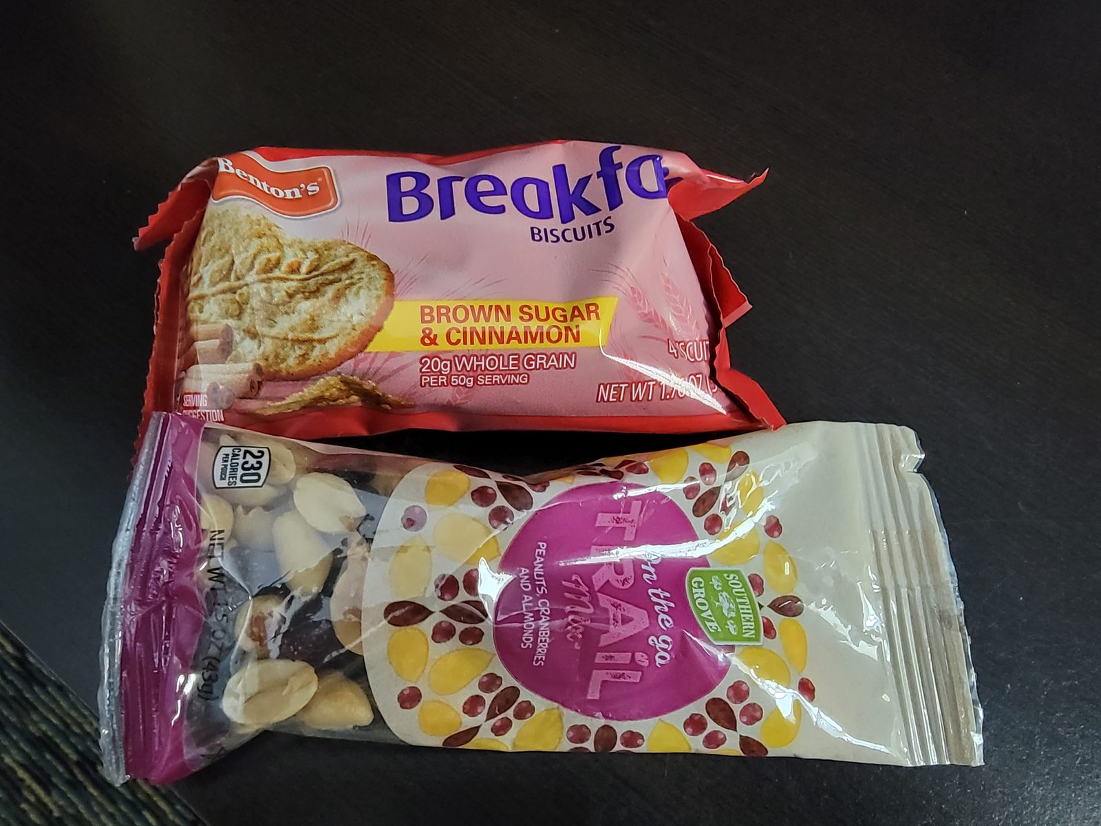Hotel breakfast before boarding, a biscuit and trail mix