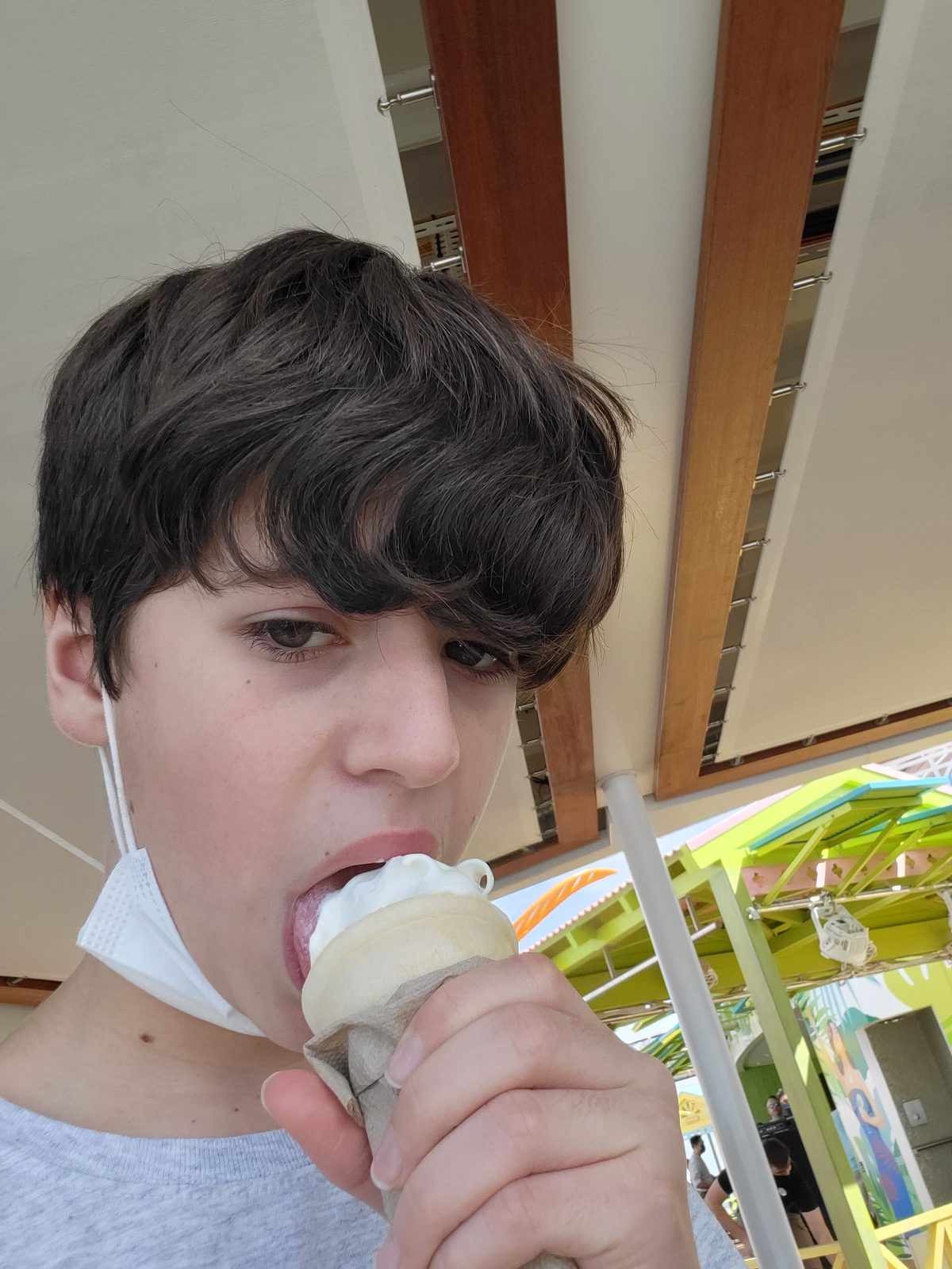Thomas celebrates boarding with an ice cream cone