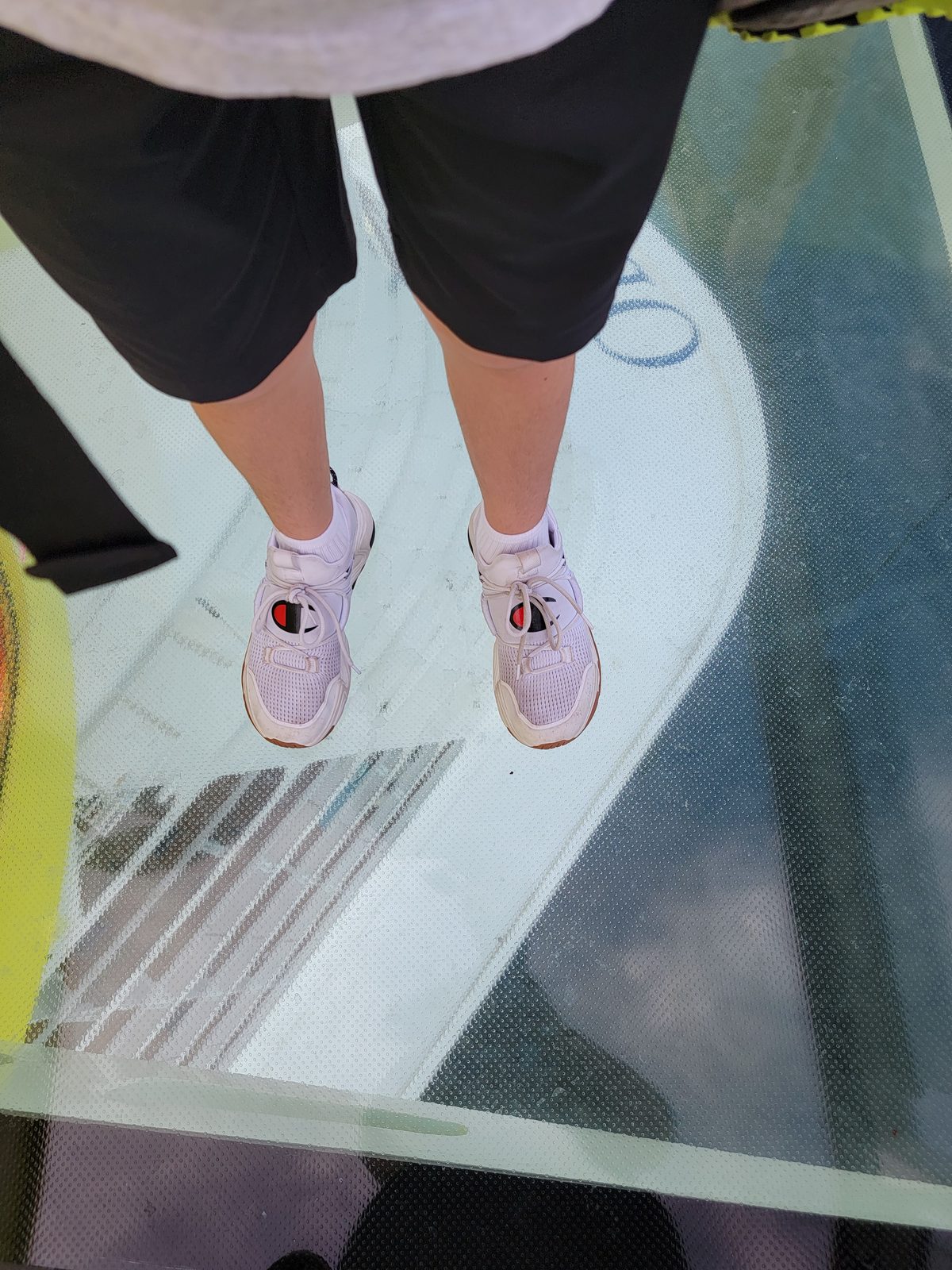 Standing on the glass floor, 15 decks above the ocean