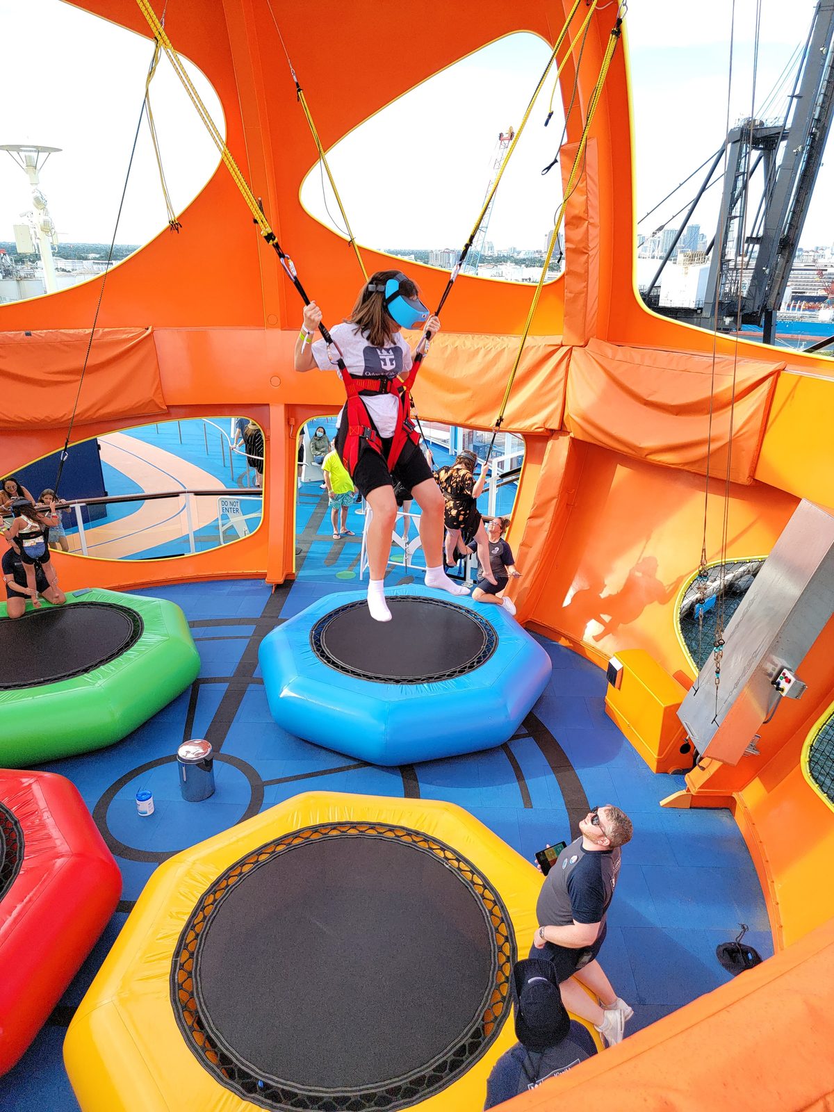 Bouncing on the SkyPad trampolines above the pool deck