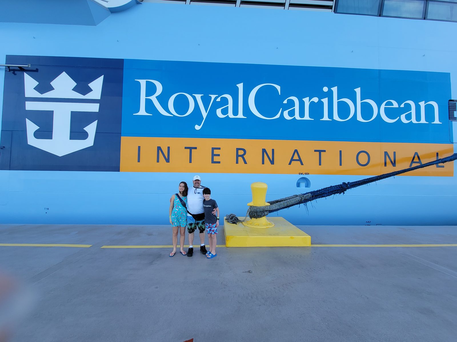 Us under the Royal Caribbean sign