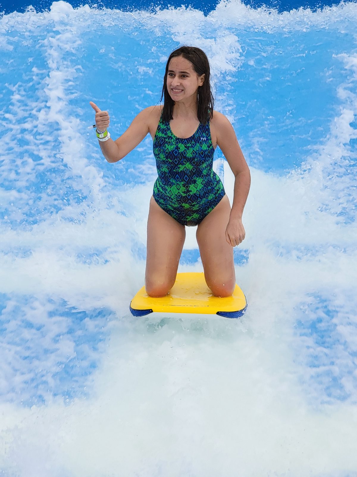 Lisa riding the FlowRider