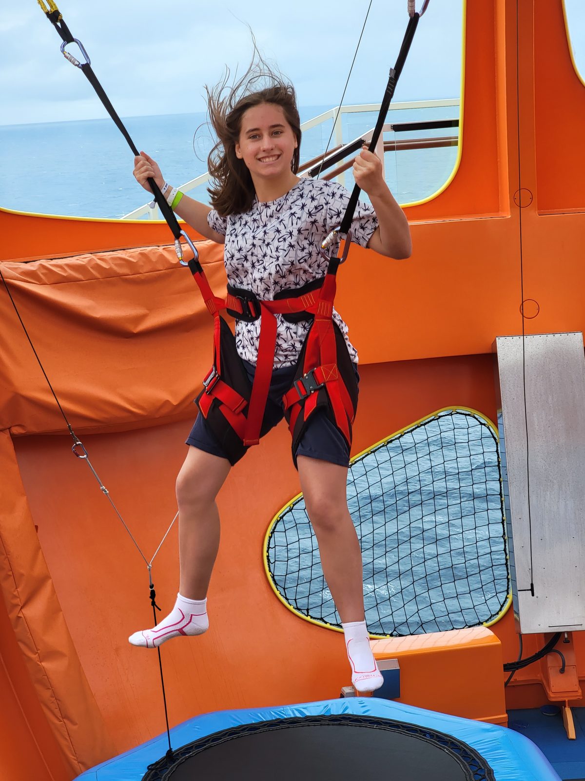 Lisa flying on the SkyPad trampoline