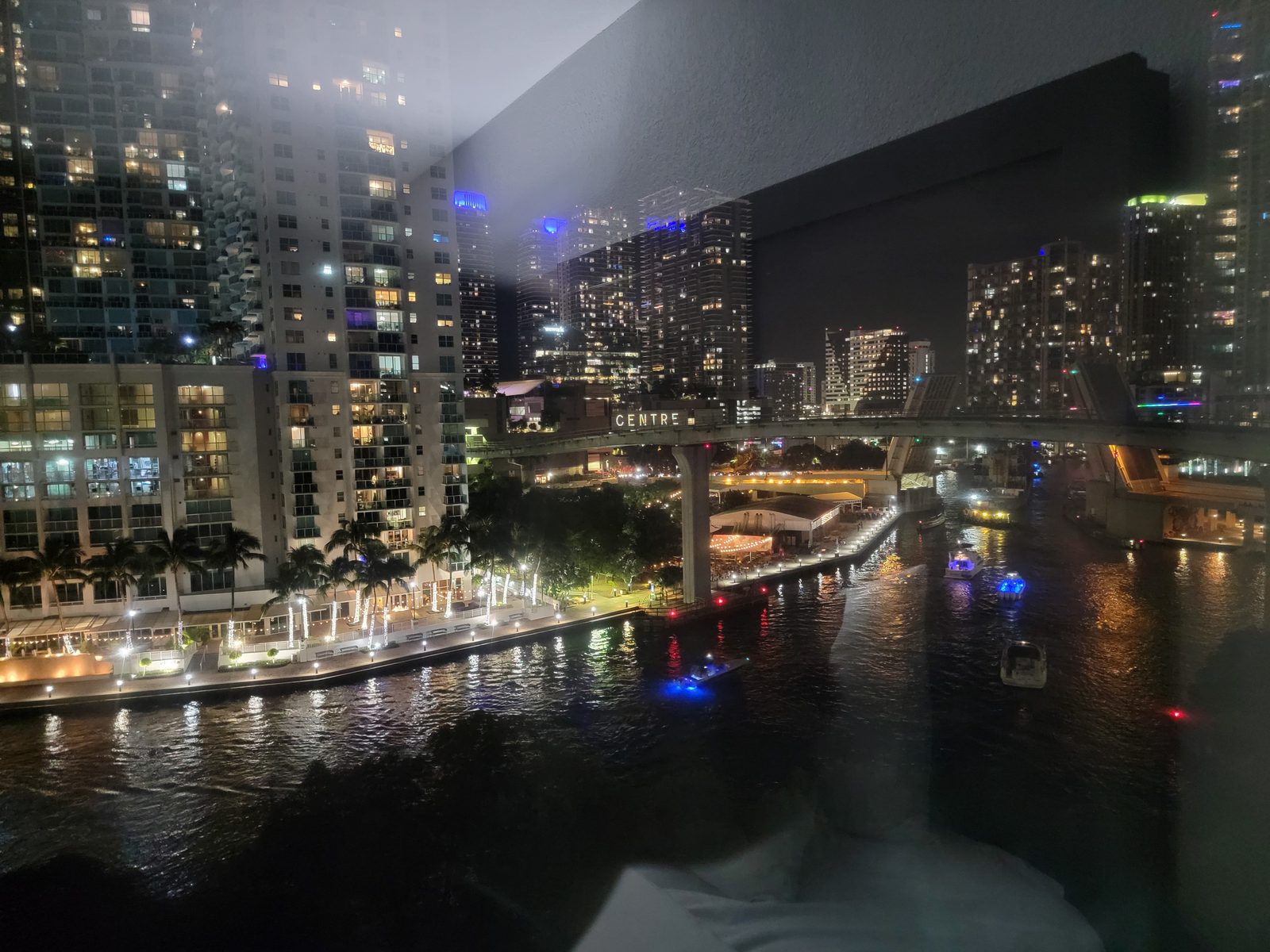 Miami lit up below us that first night