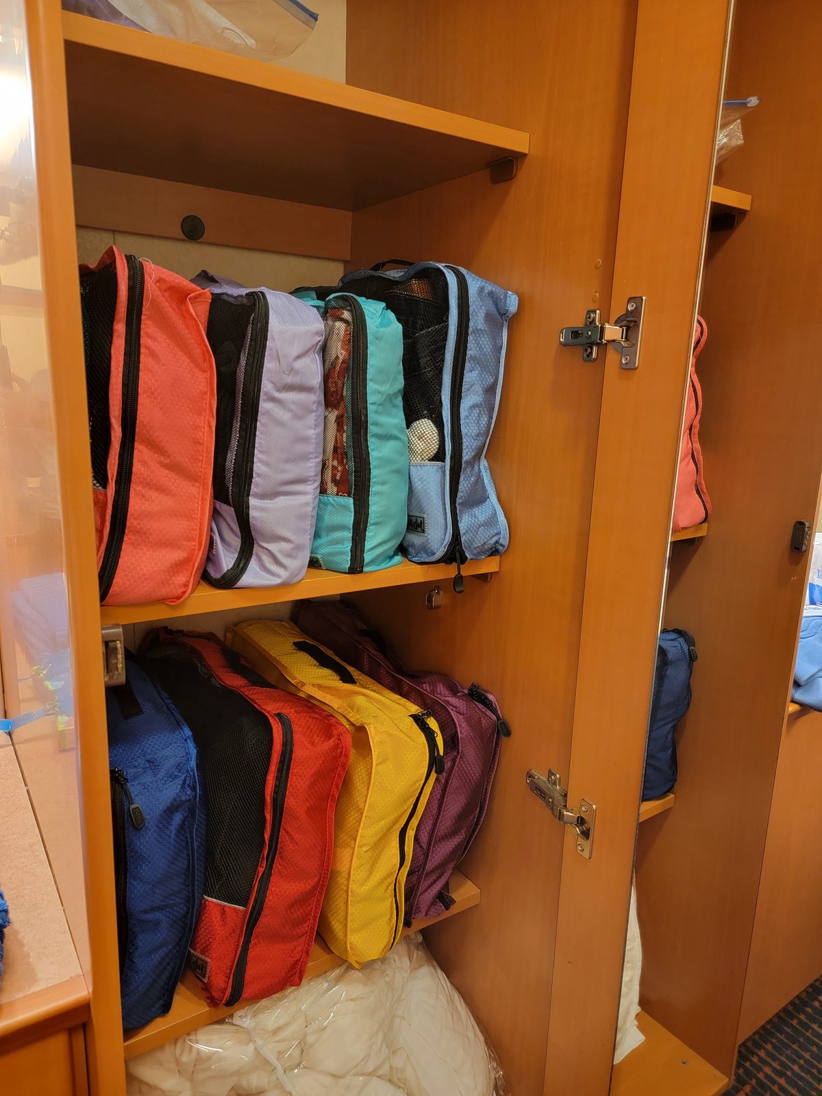 Packing cubes in our huge stateroom closet