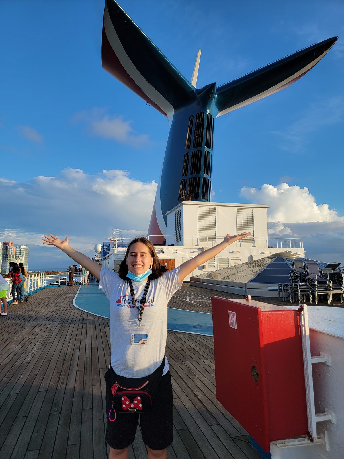 Lisa by the ship's tail fin