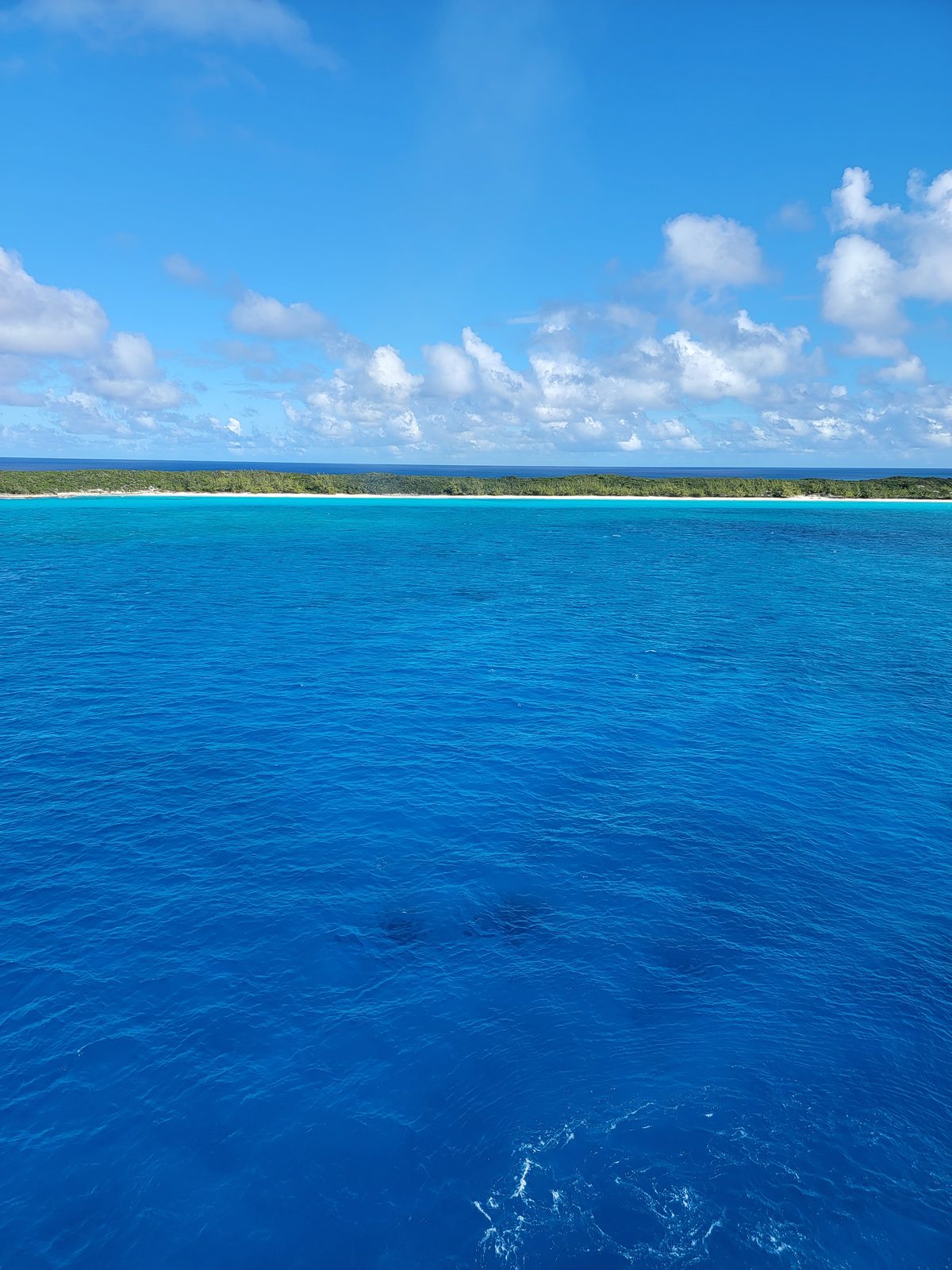 Half Moon Cay on the horizon