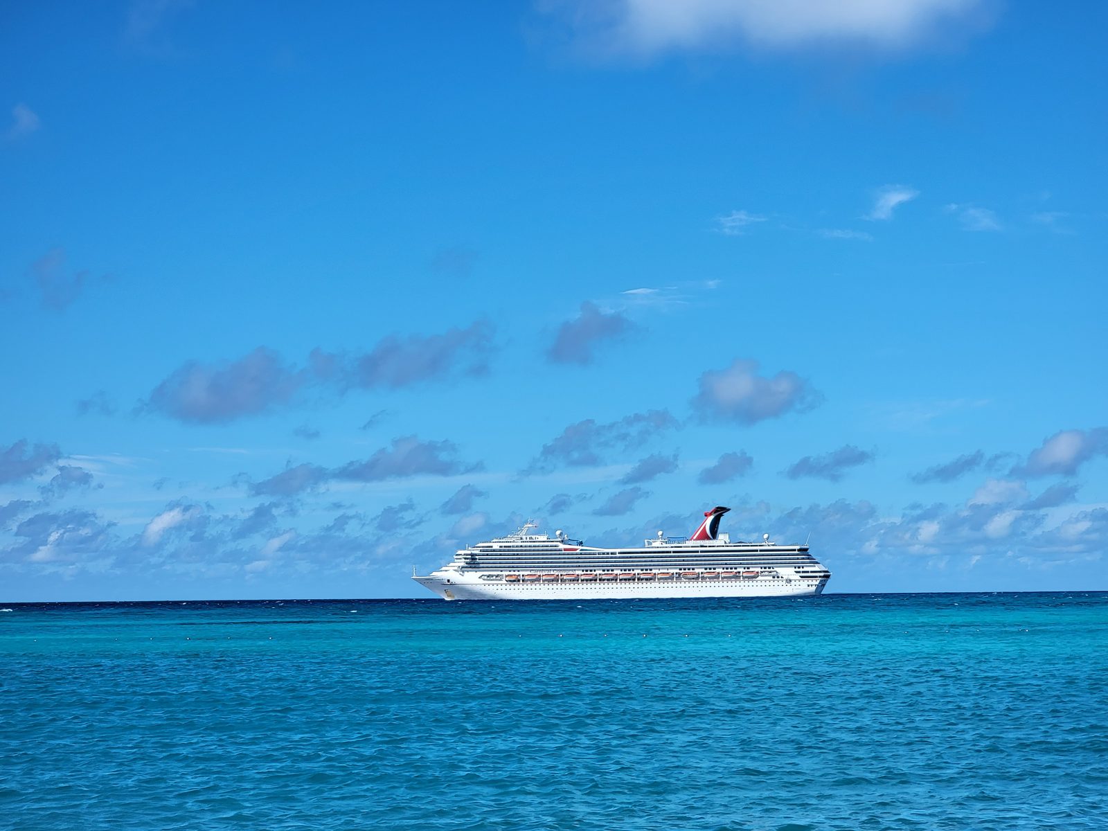 The Conquest anchored off Half Moon Cay