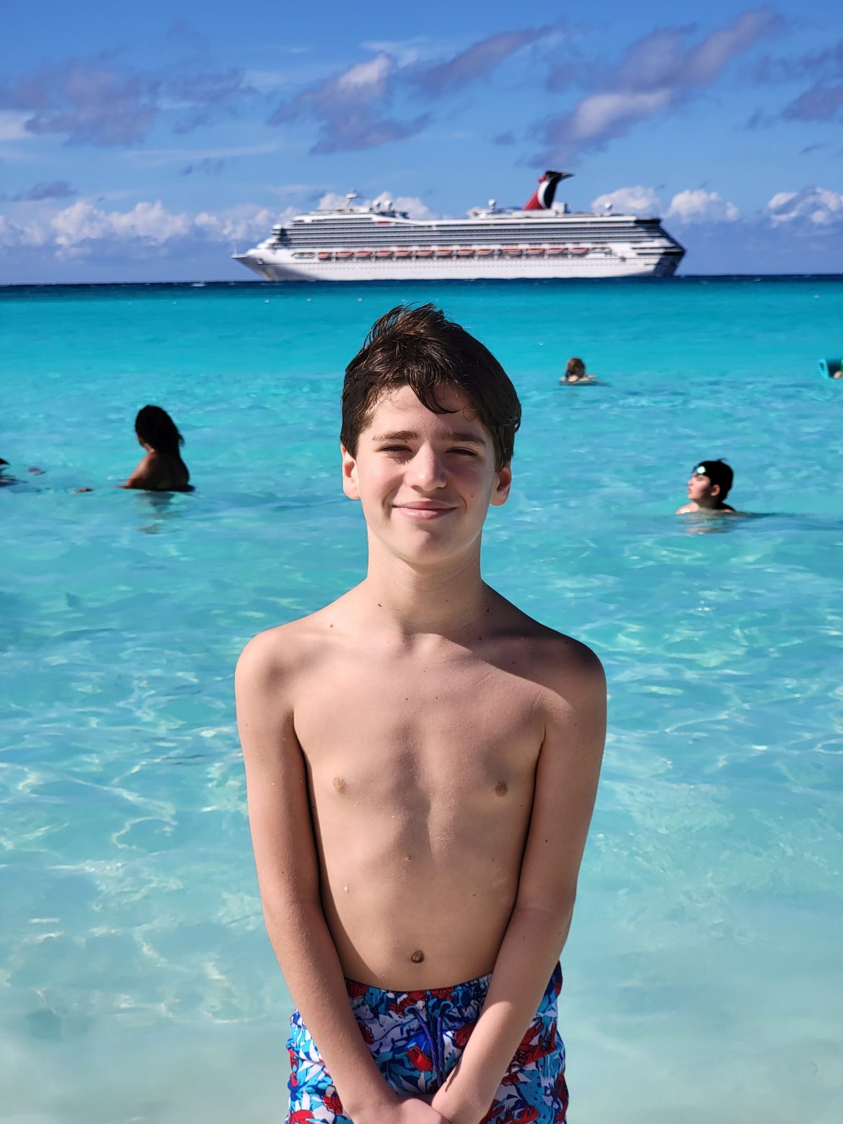 Thomas standing in the clear water