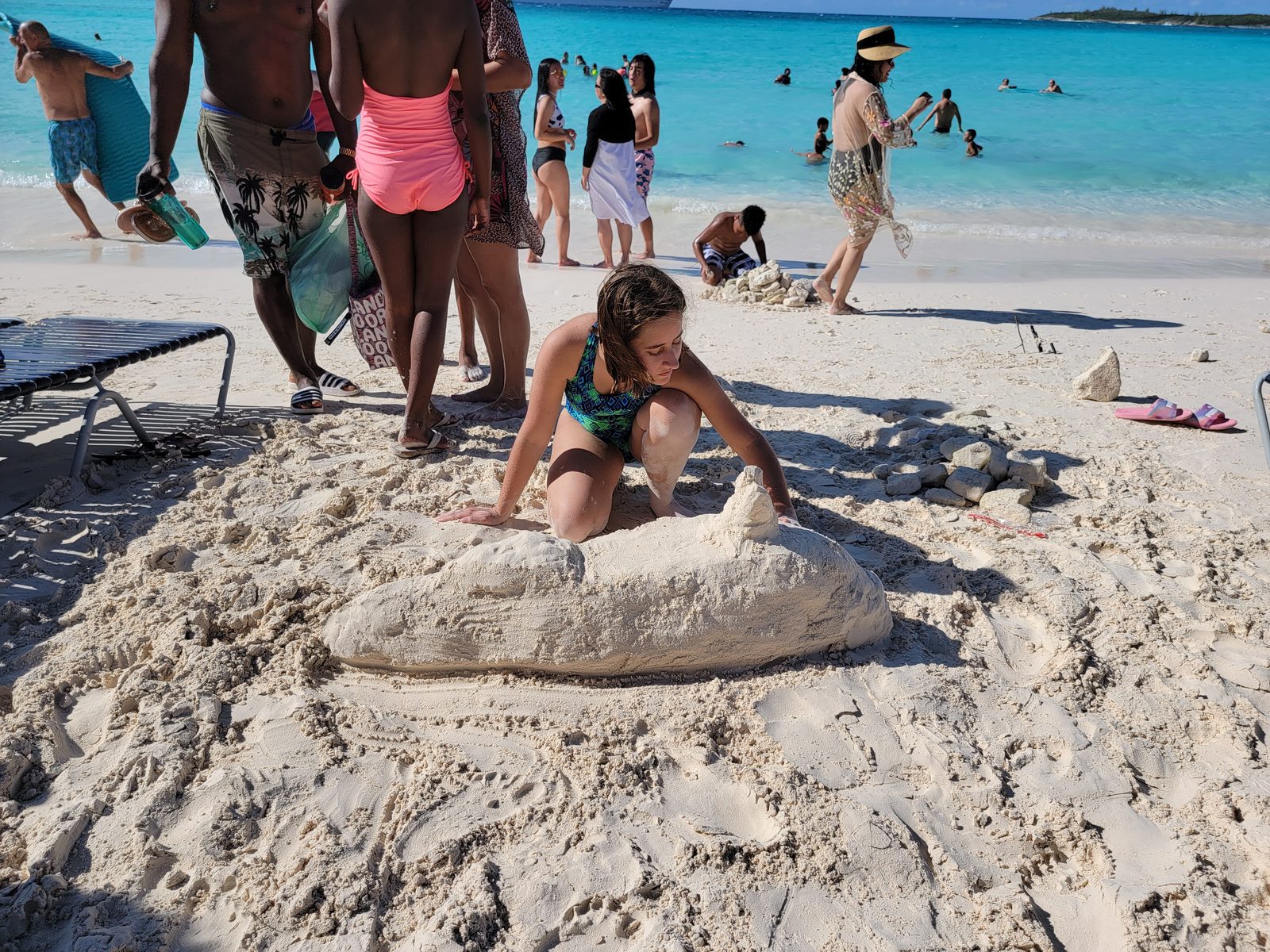 Lisa's sand shark takes shape on the beach