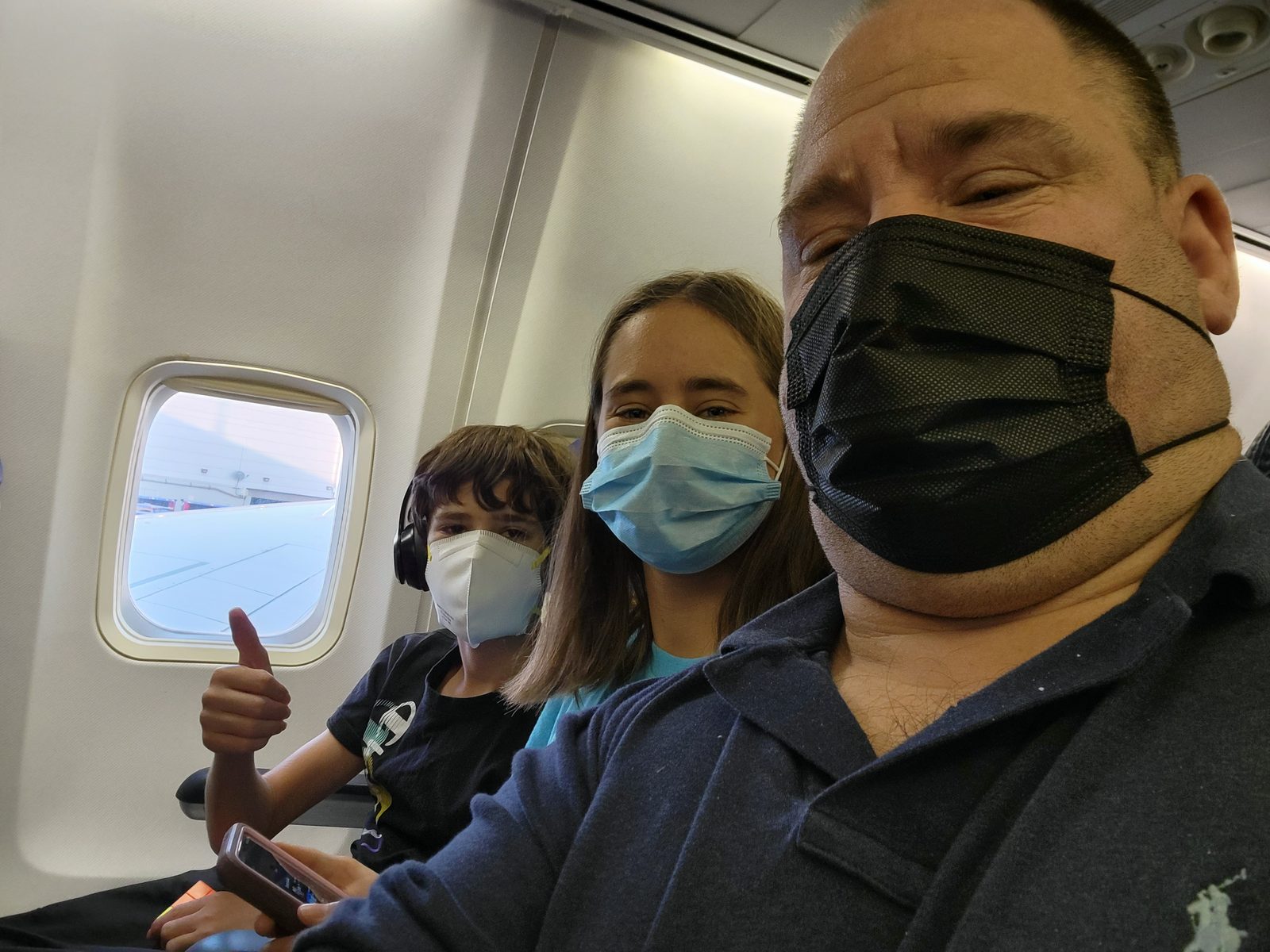 Masked up with Lisa for the flight to Orlando