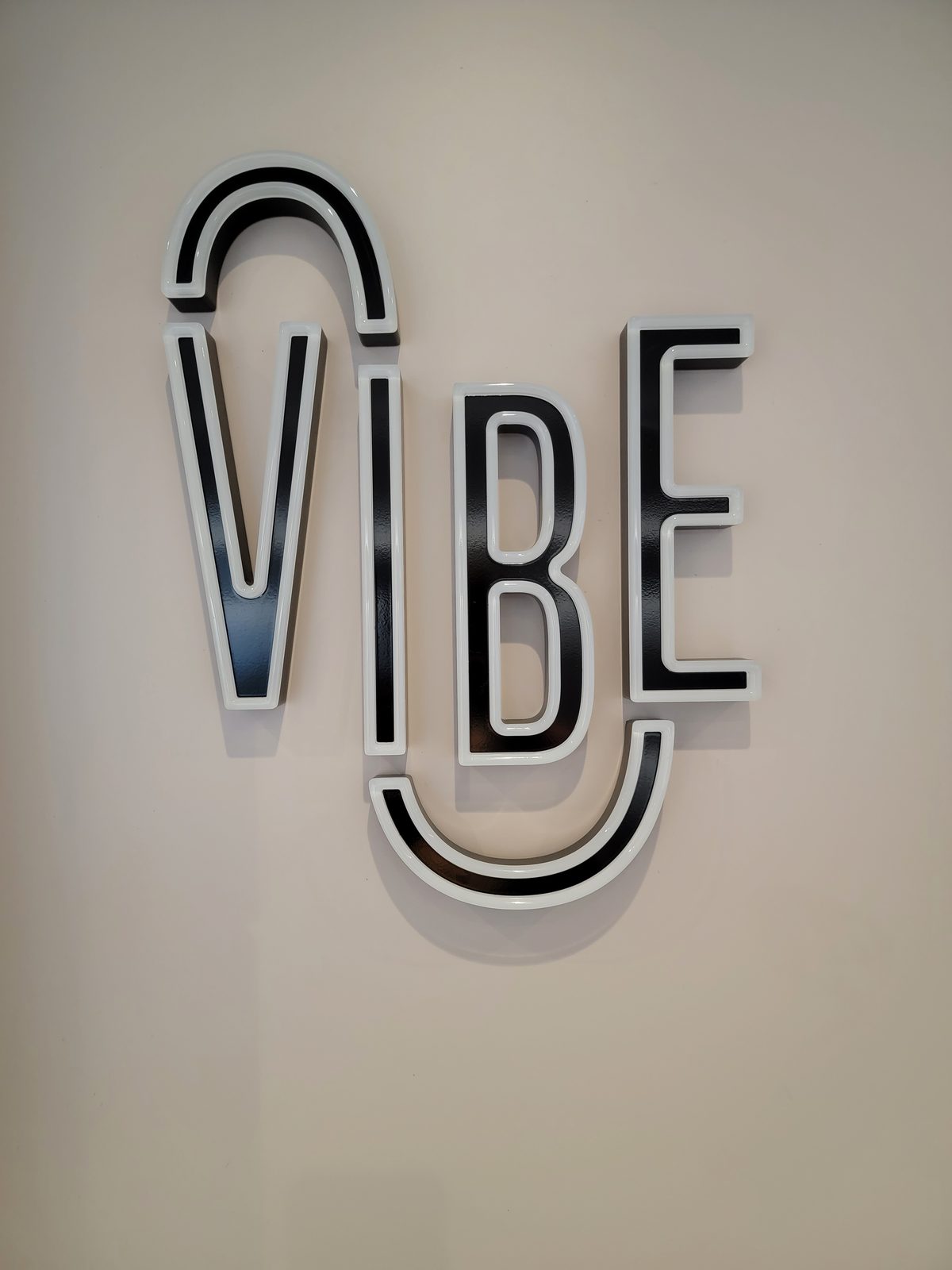 The Vibe sign on the Wish
