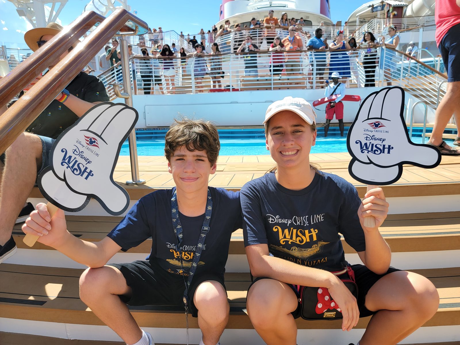 Thomas and Lisa with Wish foam hands at sail away