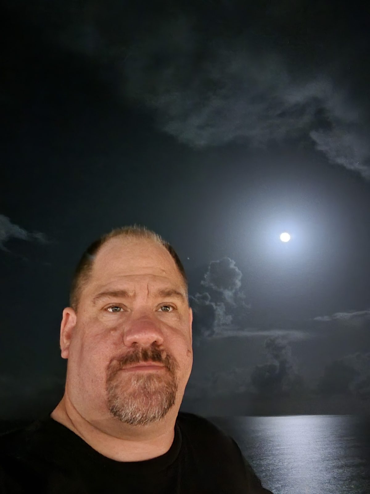 Up on deck under the moon after dinner