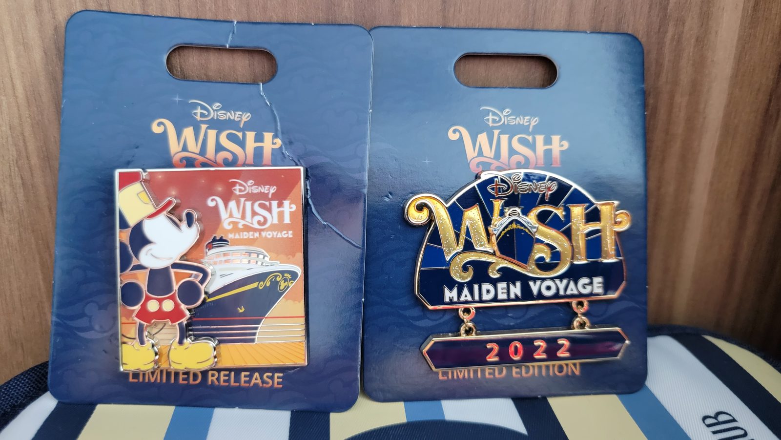 Our two Disney Wish Maiden Voyage pins