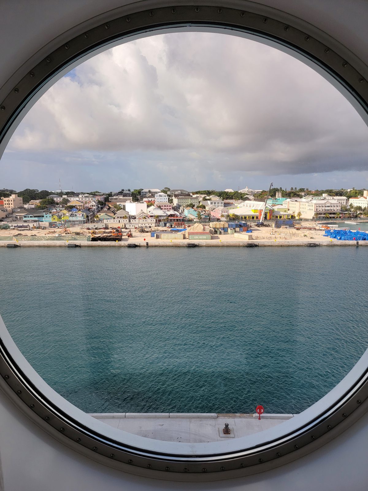Nassau through a round window on the Wish