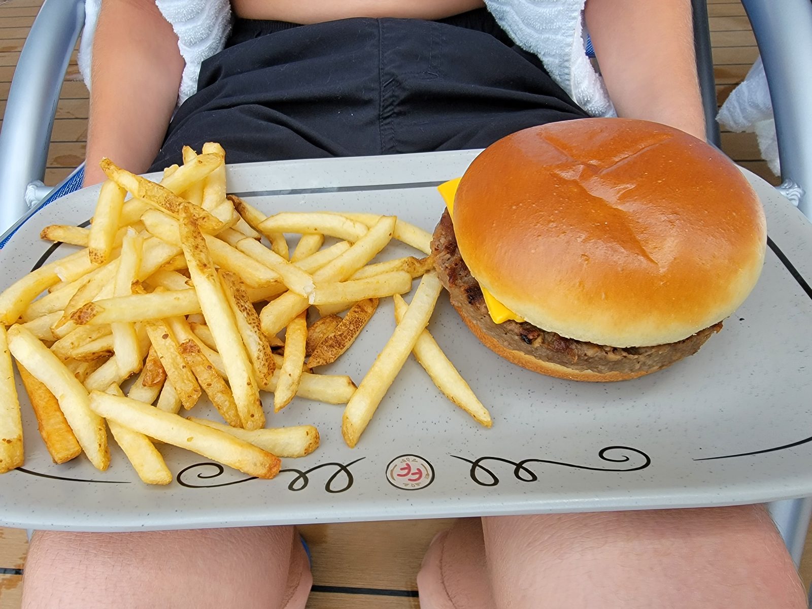 Burger and fries on deck at lunch in Nassau