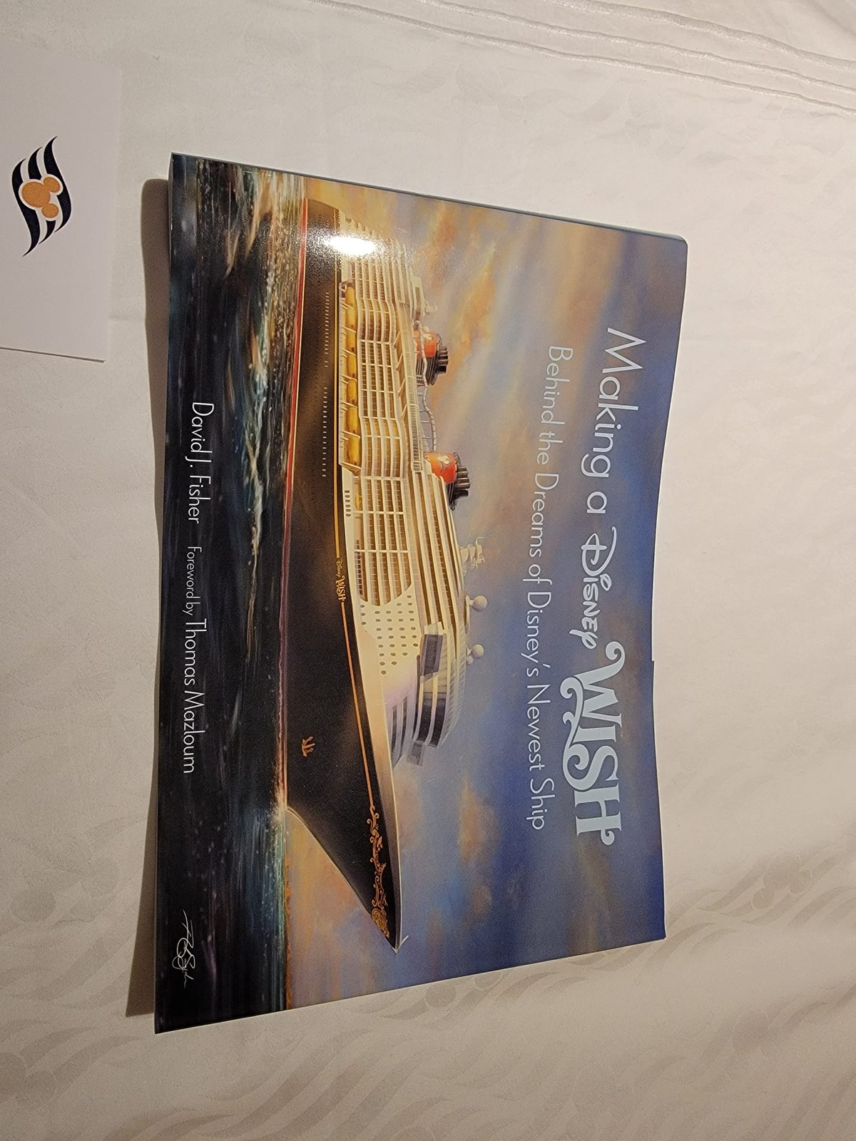 A hardcover book to mark the Wish's first sailing