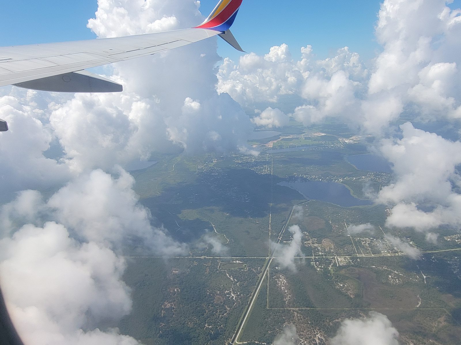 Florida lakes and marsh below as we fly home
