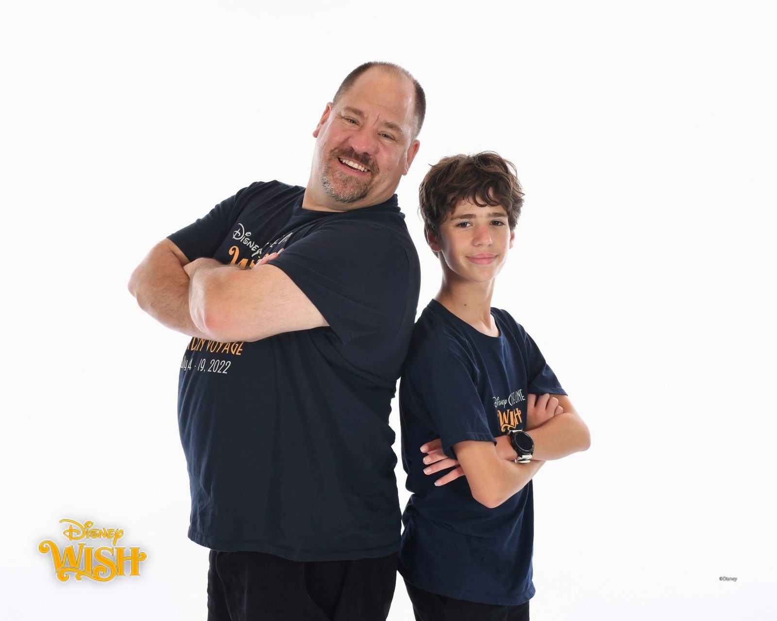 Thomas and Michael, arms crossed, on the Wish