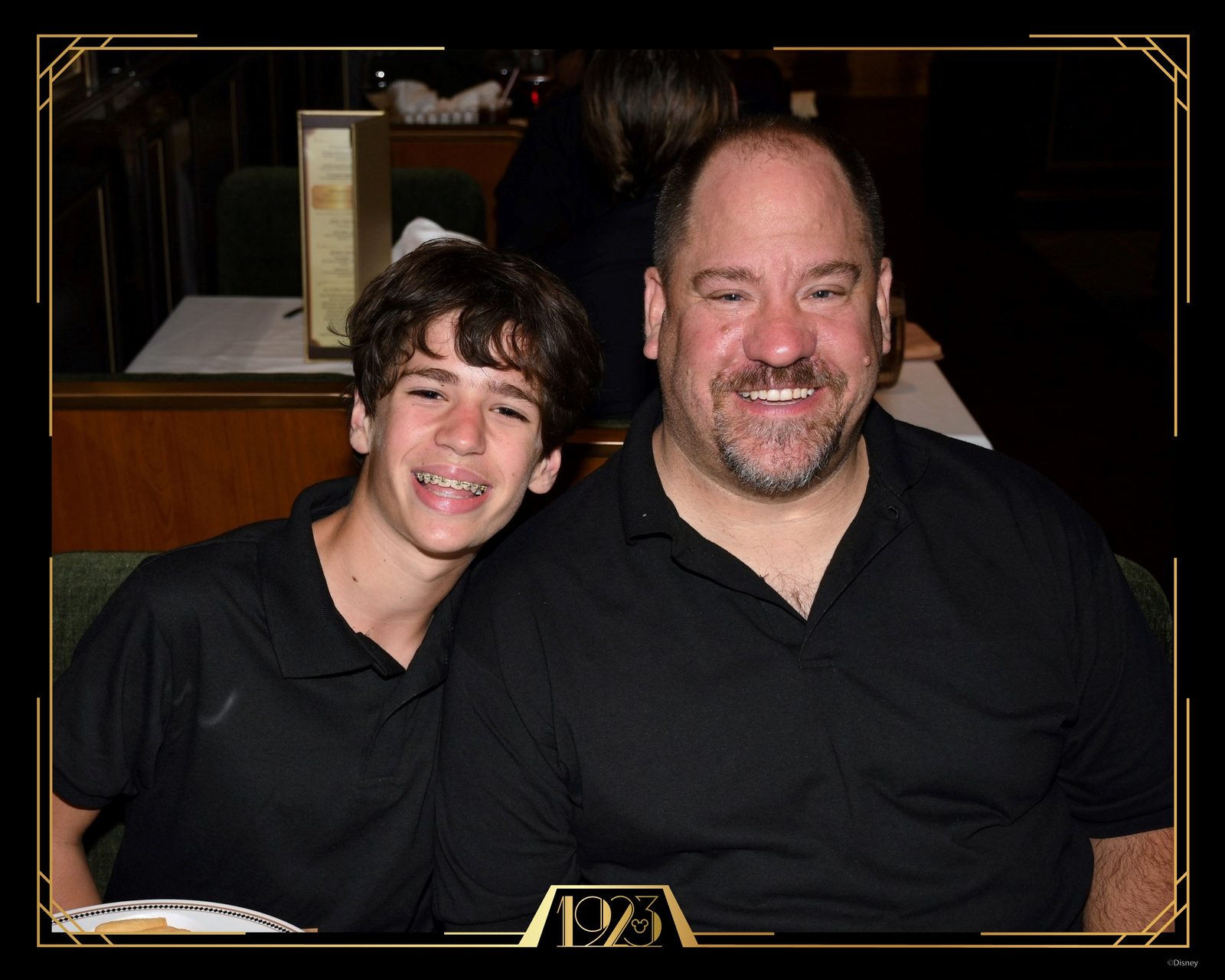 Thomas and Michael at dinner in 1923