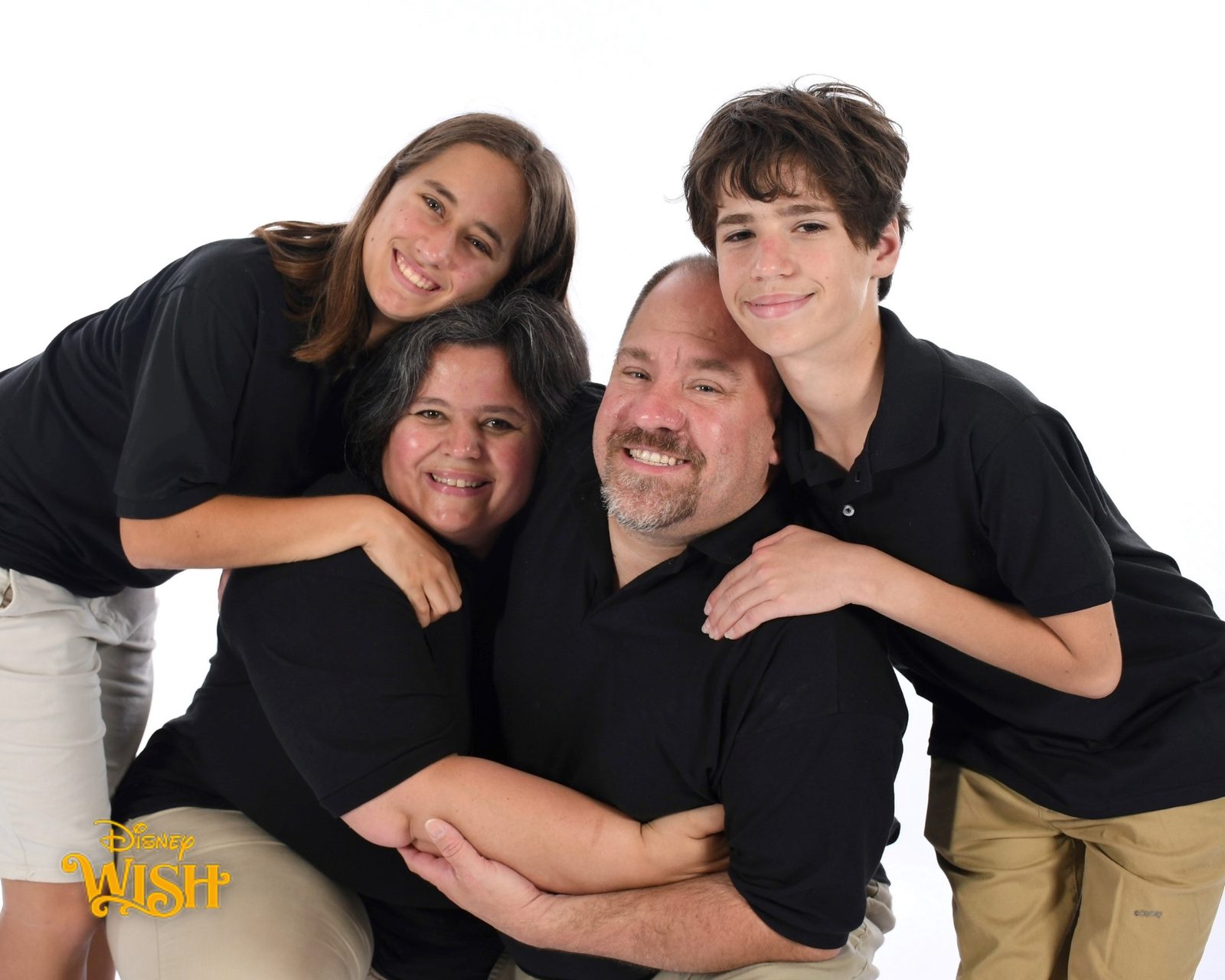 The four of us in a group hug on the Wish