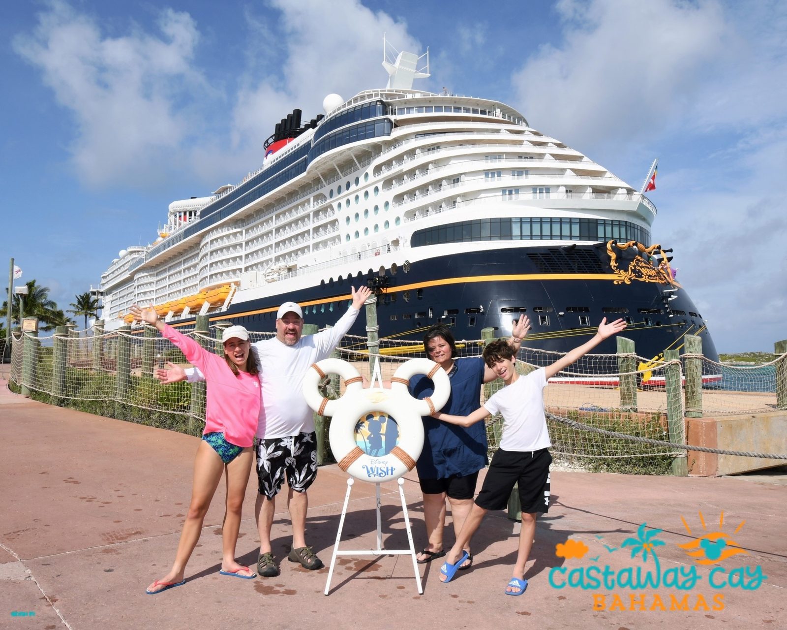 The four of us with the Mickey life ring at Castaway Cay