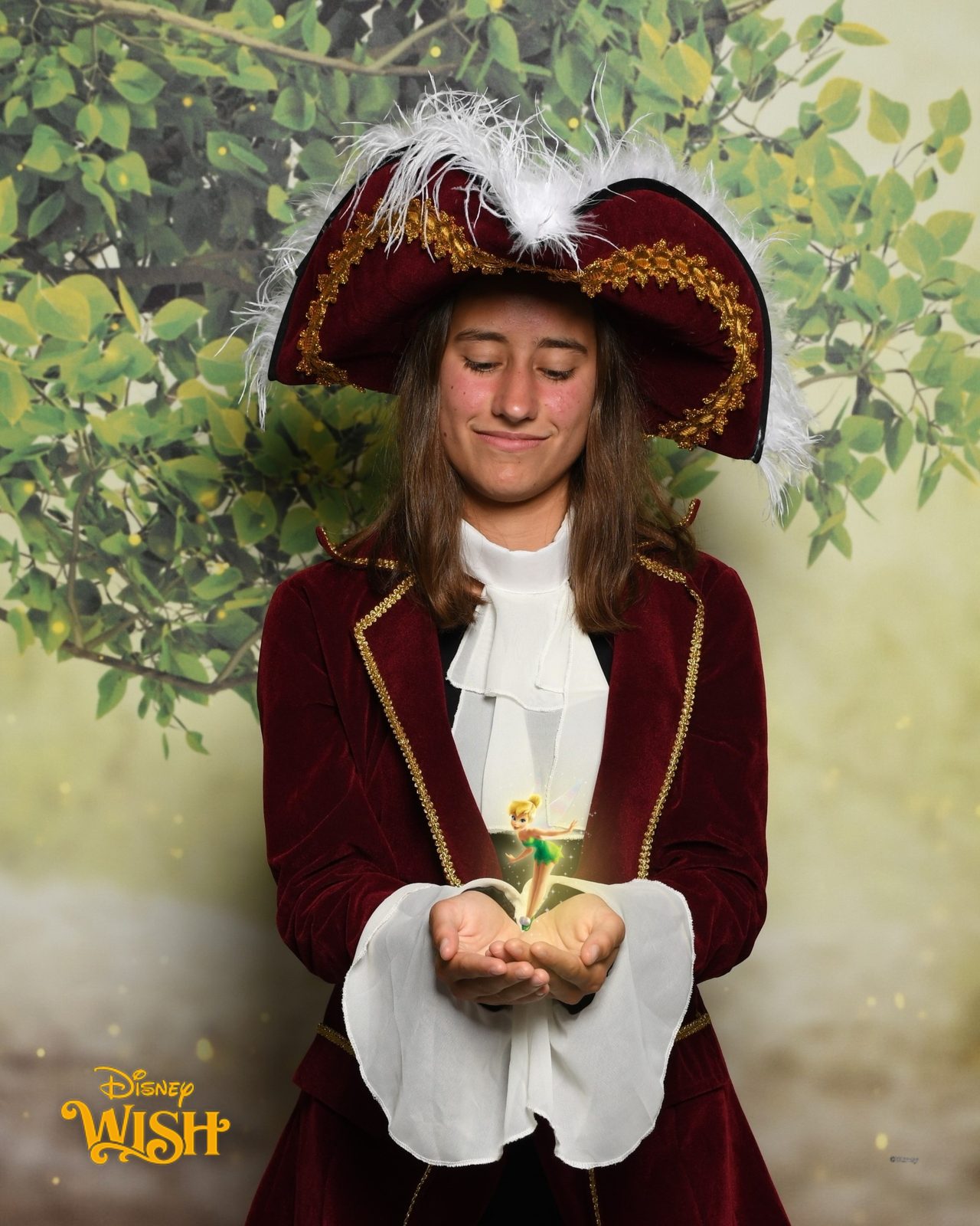 Lisa with Tinker Bell in her hands on Pirate Night