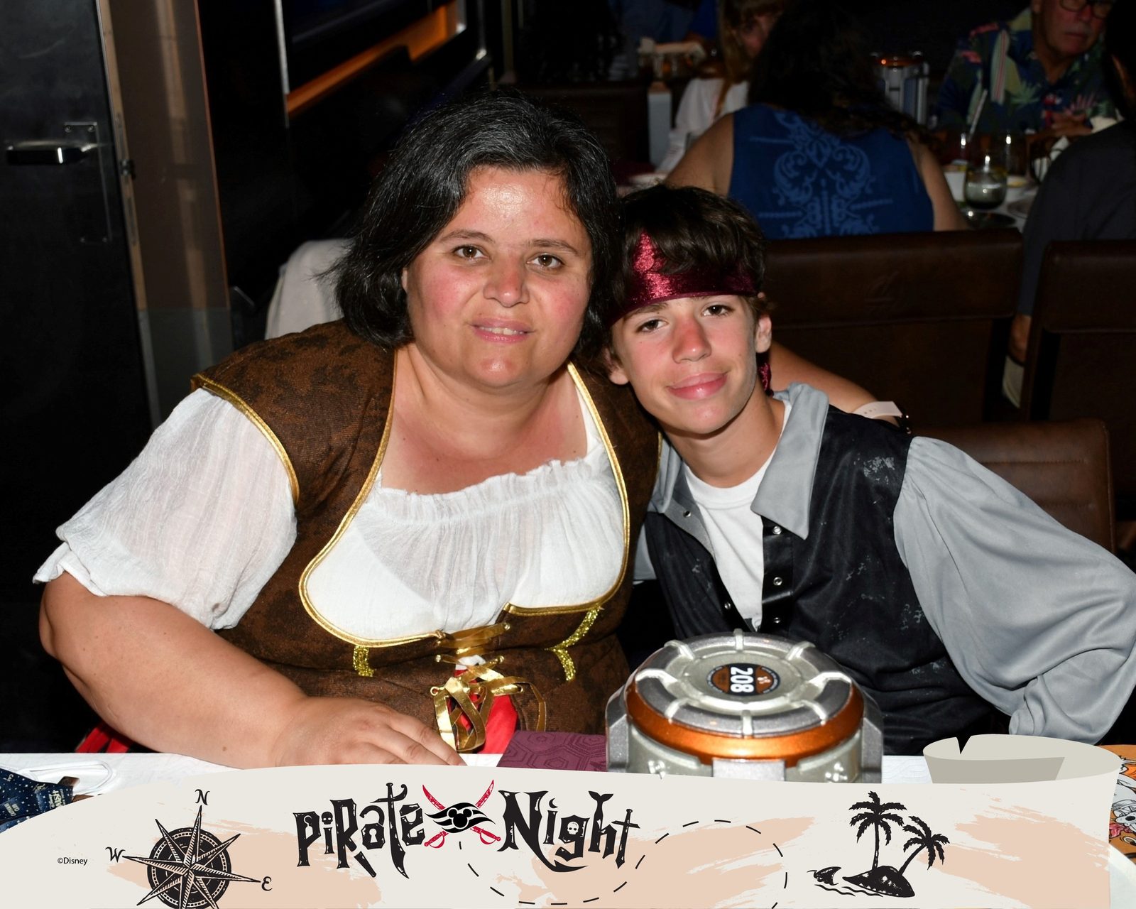 Kathy and Thomas at dinner on Pirate Night
