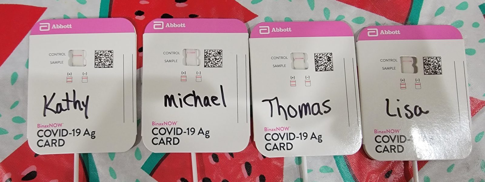 COVID test cards for the four of us before we left