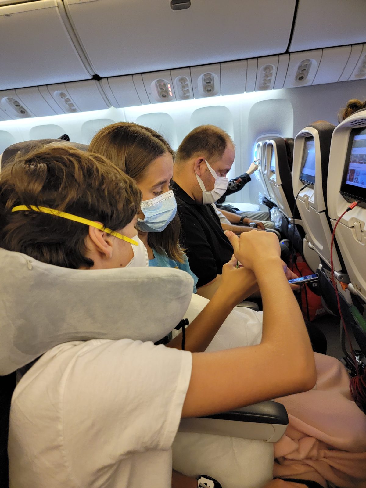 Settling in for the overnight flight to Rome
