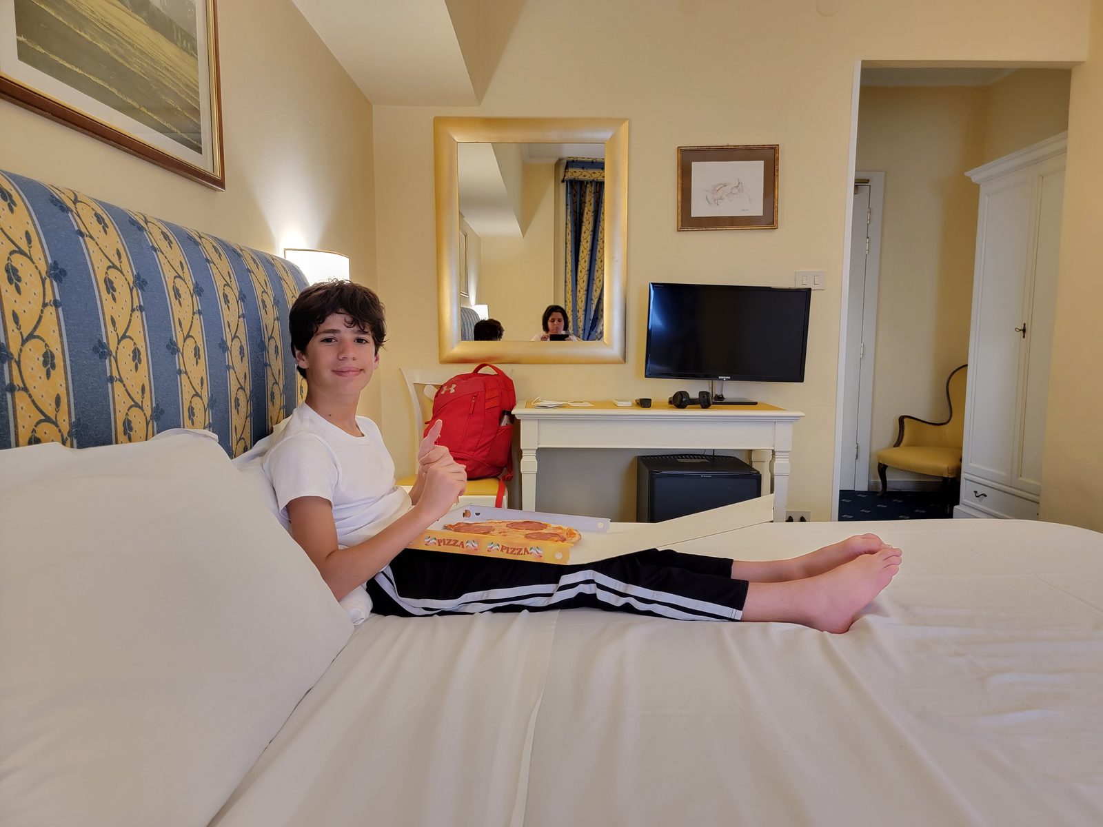 Thomas with his pizza at the Hotel Napoleon