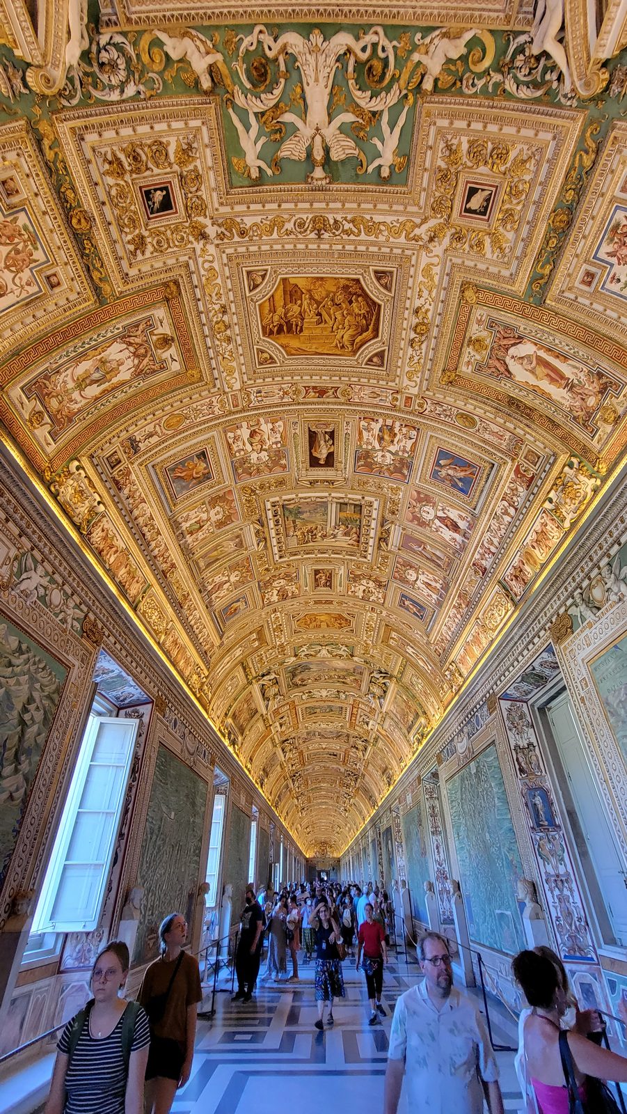 The long gold ceiling of the Map Gallery