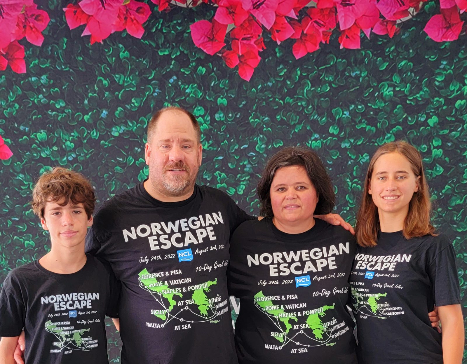 Boarding day in matching Norwegian Escape itinerary shirts