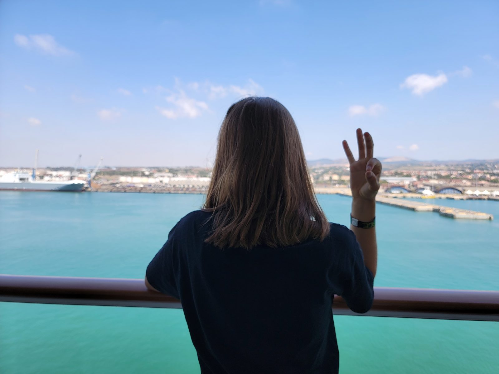 Lisa watching Civitavecchia from our balcony