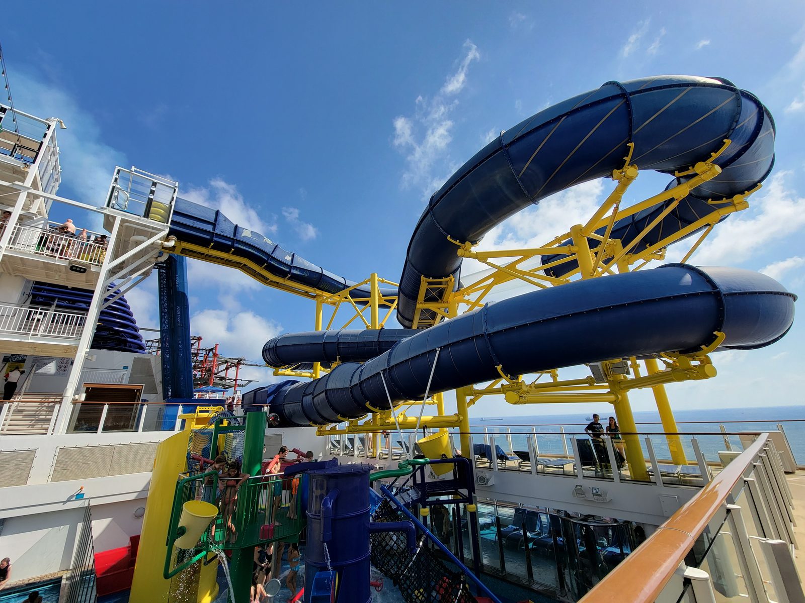 The water slides on the pool deck