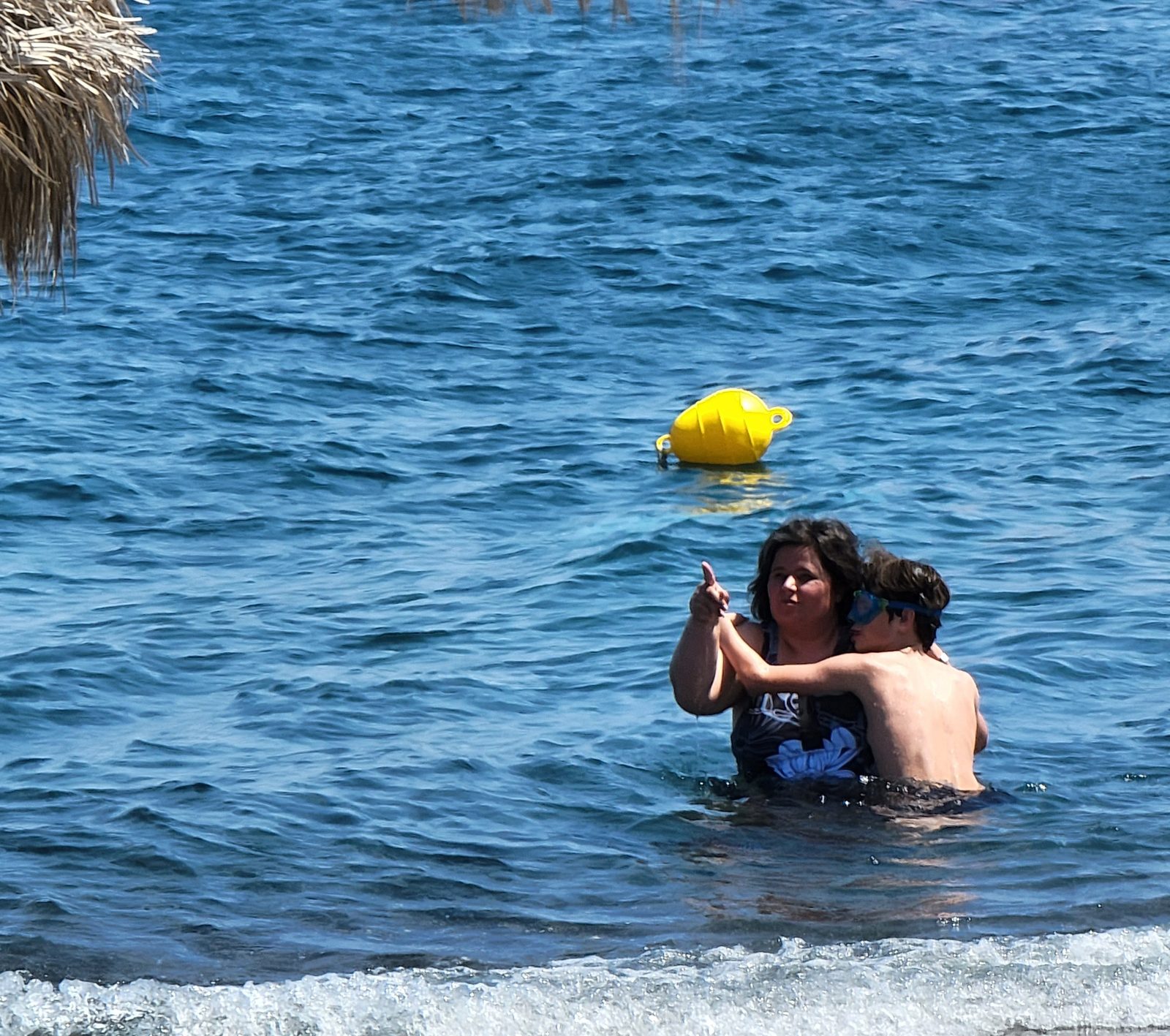 Kathy and Thomas in the water at Perivolos Beach