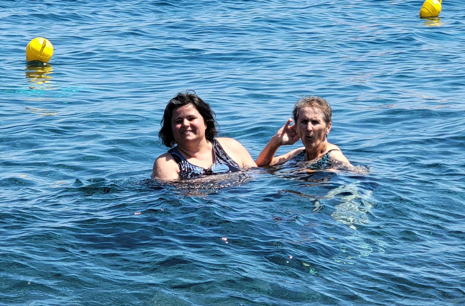Kathy and Grandma swimming at Perivolos Beach