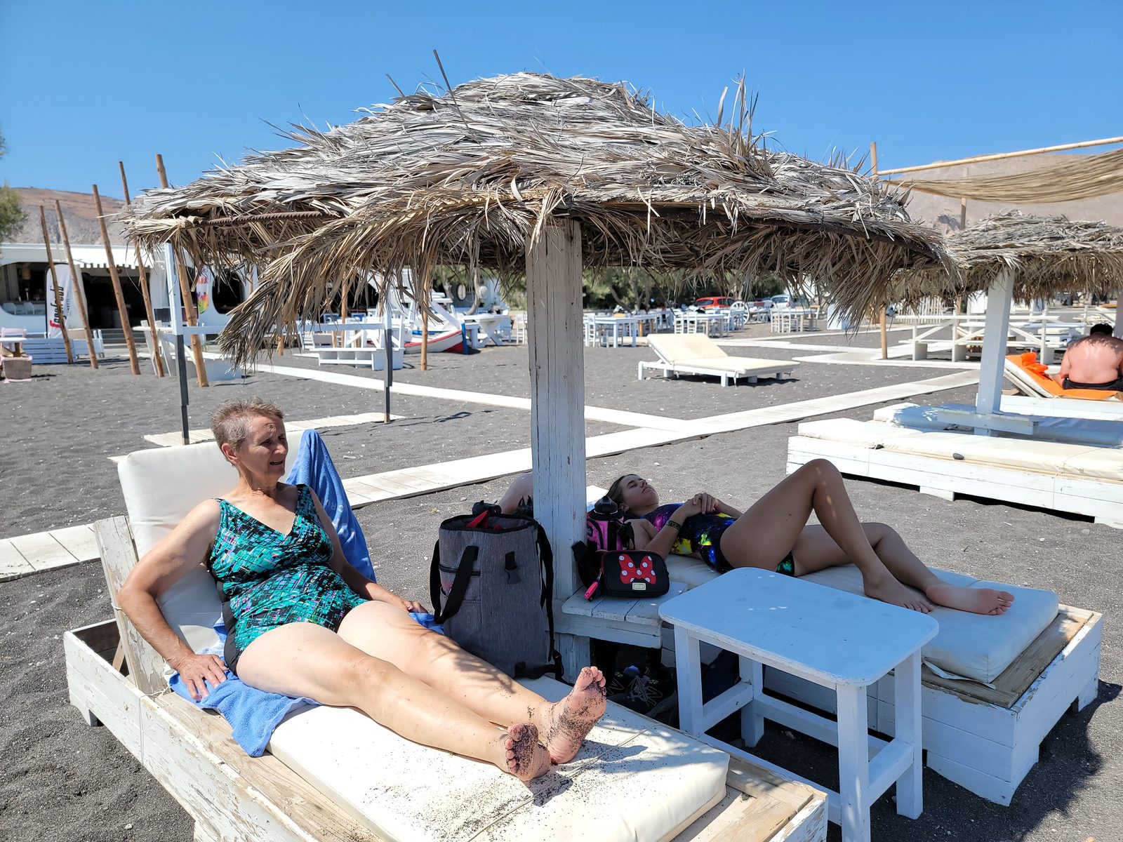 Grandma resting under our beach cabana