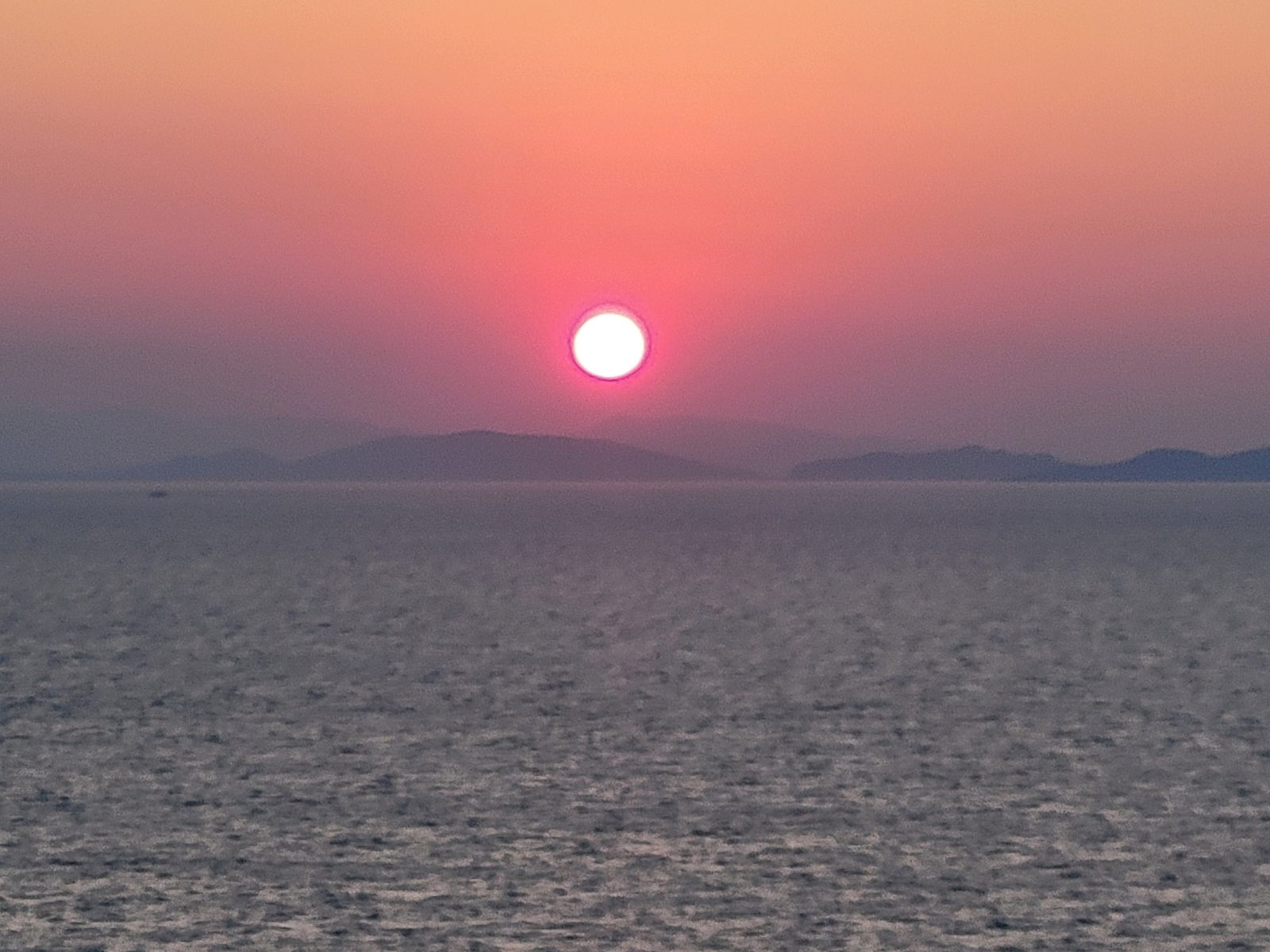 Sunset sailing out of Piraeus