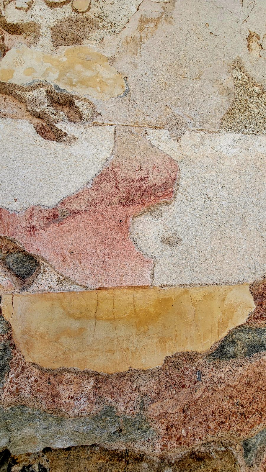 Traces of paint on a wall on Delos