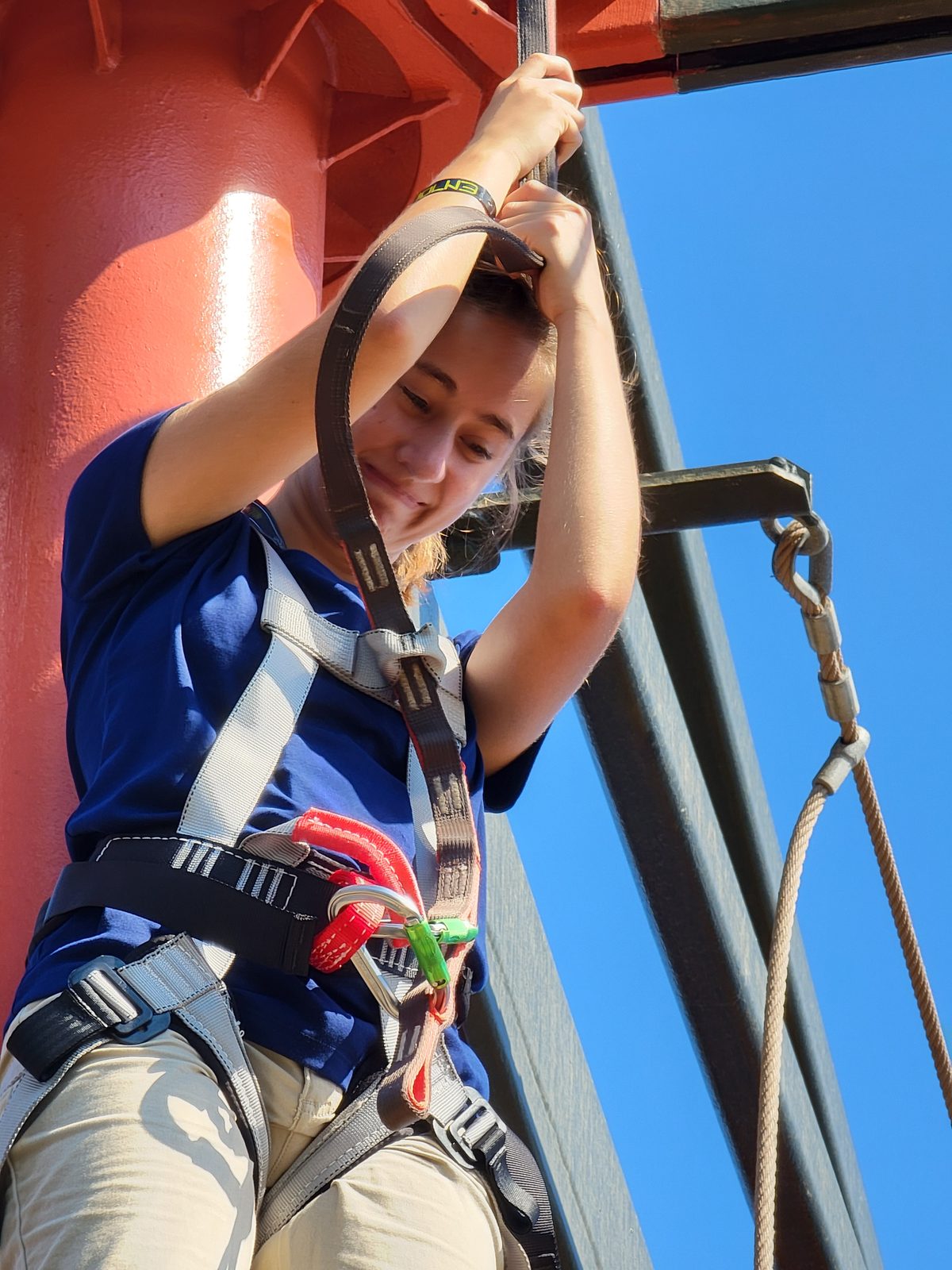 Harnessed in for the ropes course climb