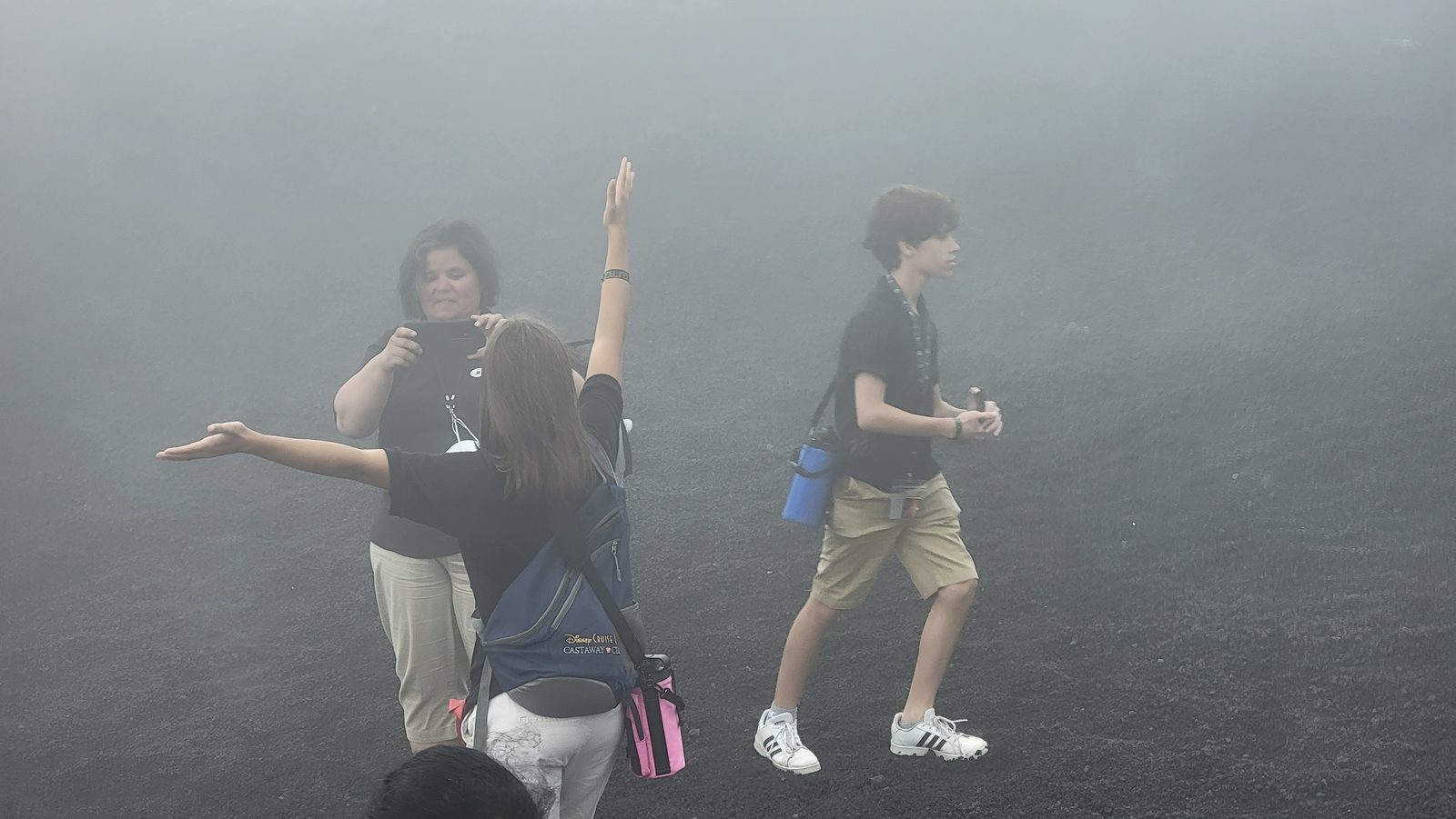 Kathy and the kids in the fog on Mount Etna