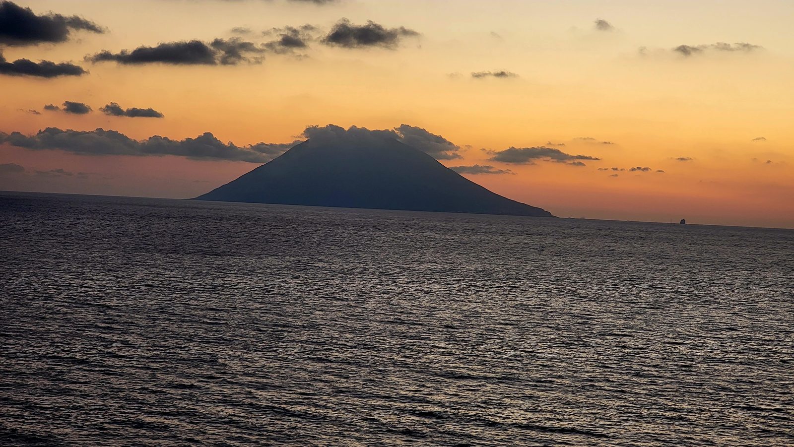 Stromboli's silhouette at sunset from the deck