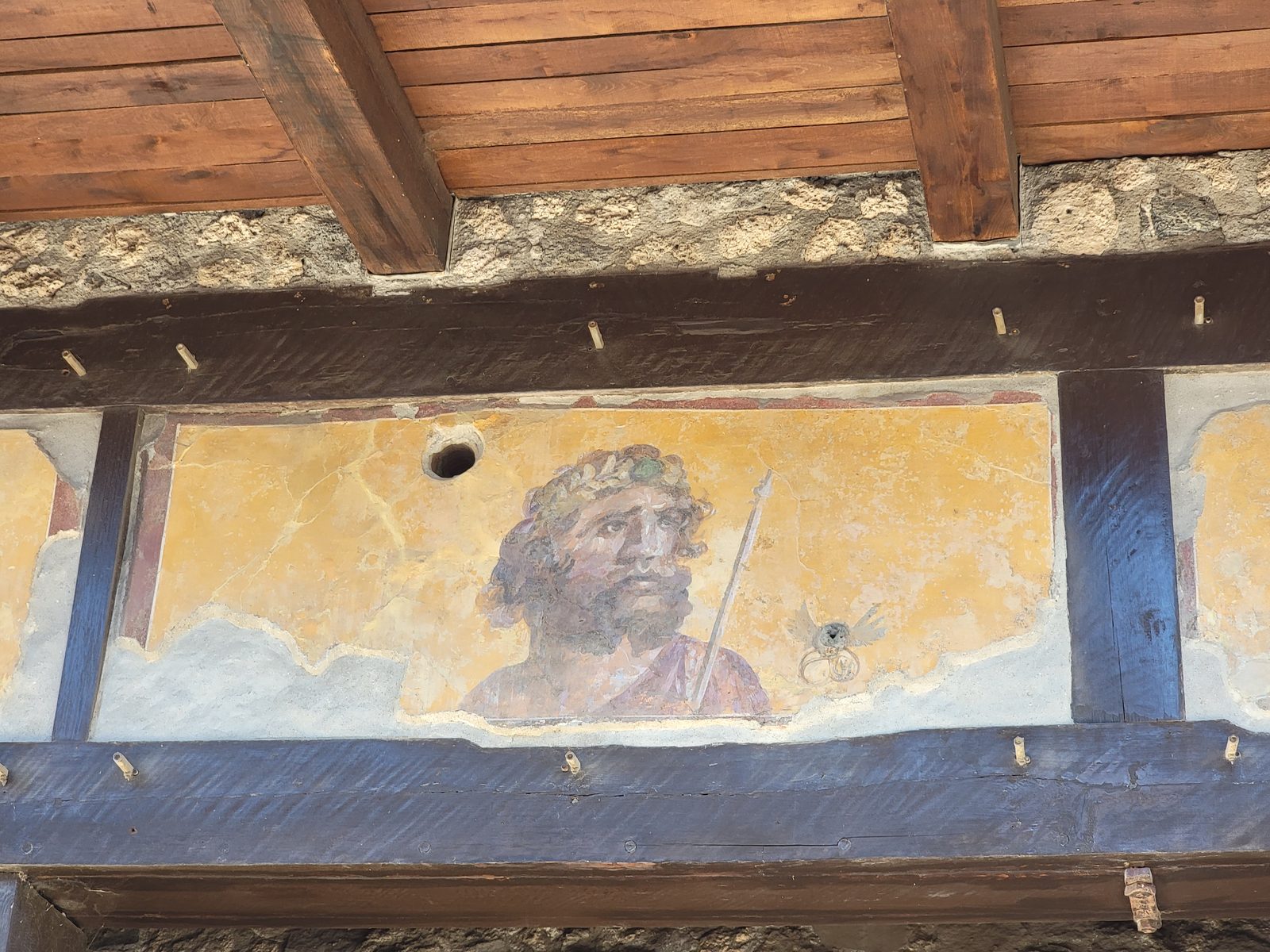 A fresco over a doorway at Pompeii